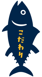 A cartoon blue fish with a smiling face and yellow Japanese characters on its body