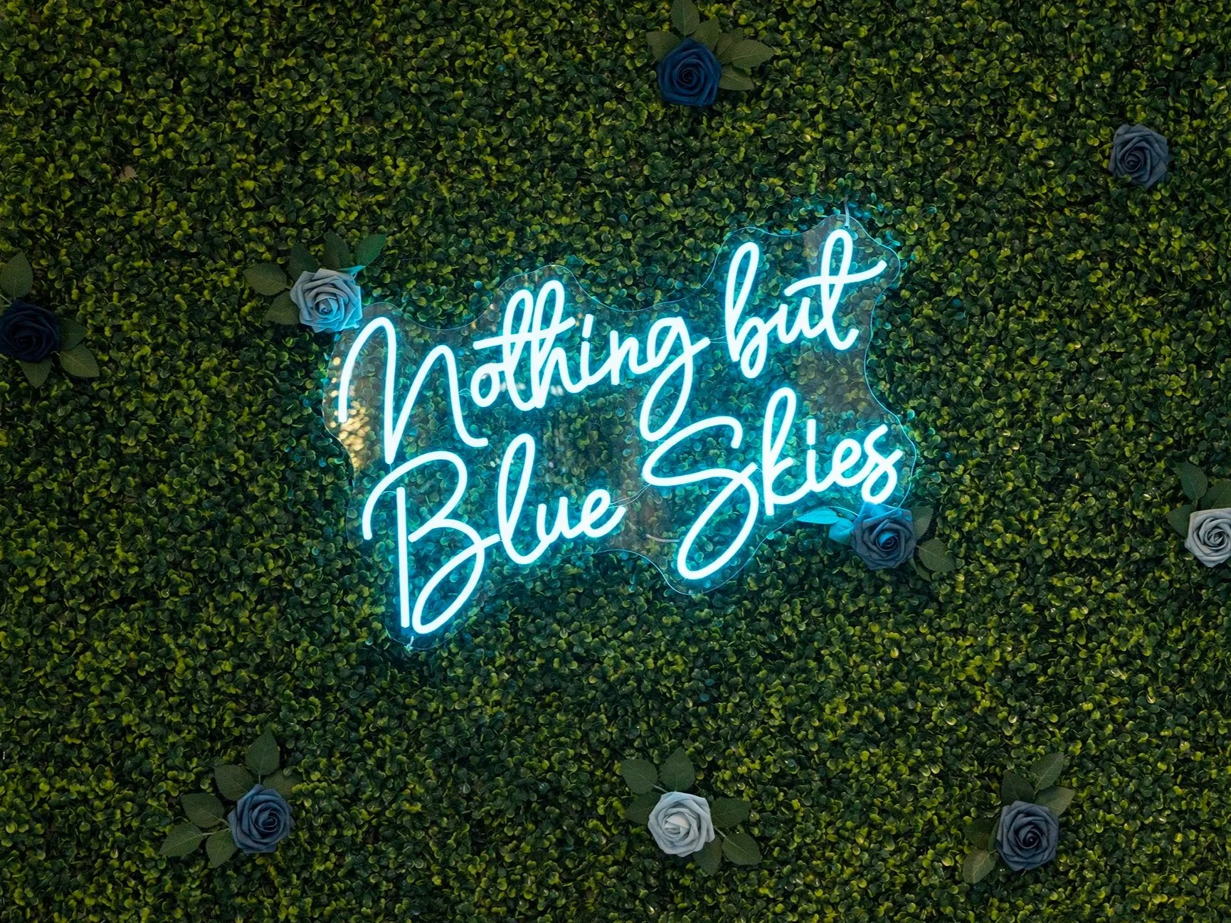 Neon sign that says Nothing but Blue Skies on the wall at Blue Skies Massage and Wellness Spa in Longmont, CO.