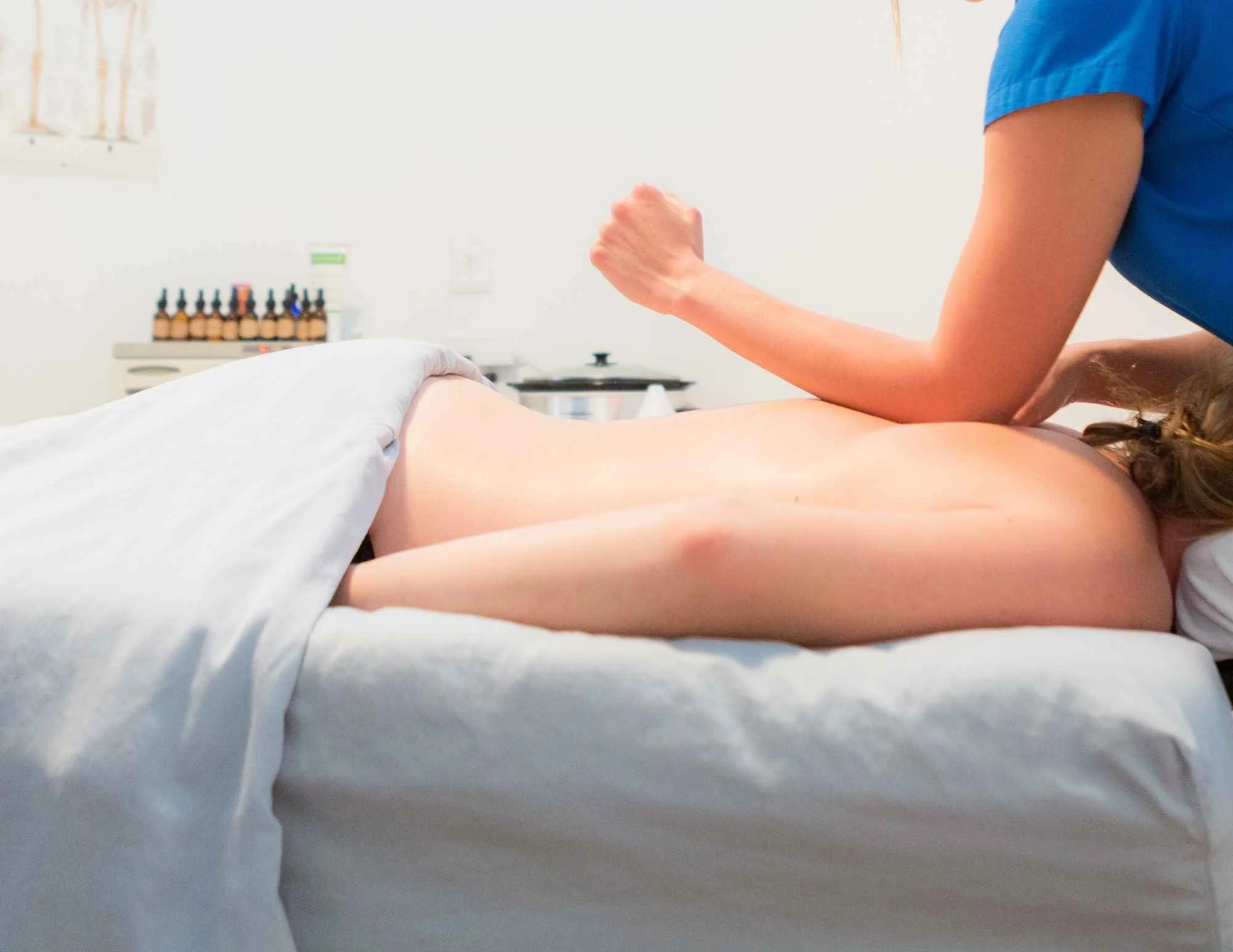 A deep tissue massage at Blue Skies Massage and Wellness Spa in Longmont, Colorado.