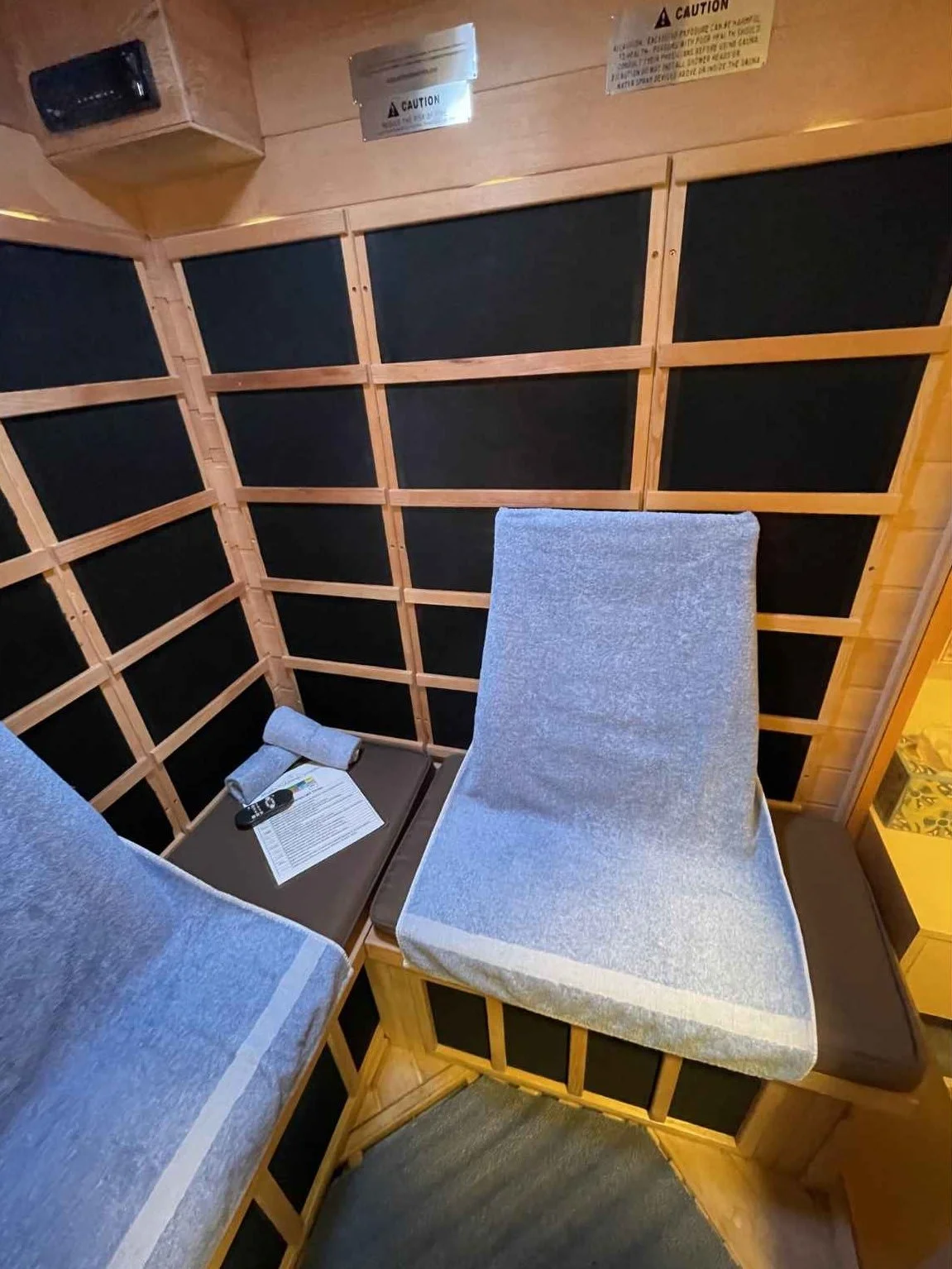 Inside photo of the private sauna at Blue Skies Massage and Wellness Spa in Longmont, Colorado, that can be used for one person or two.
