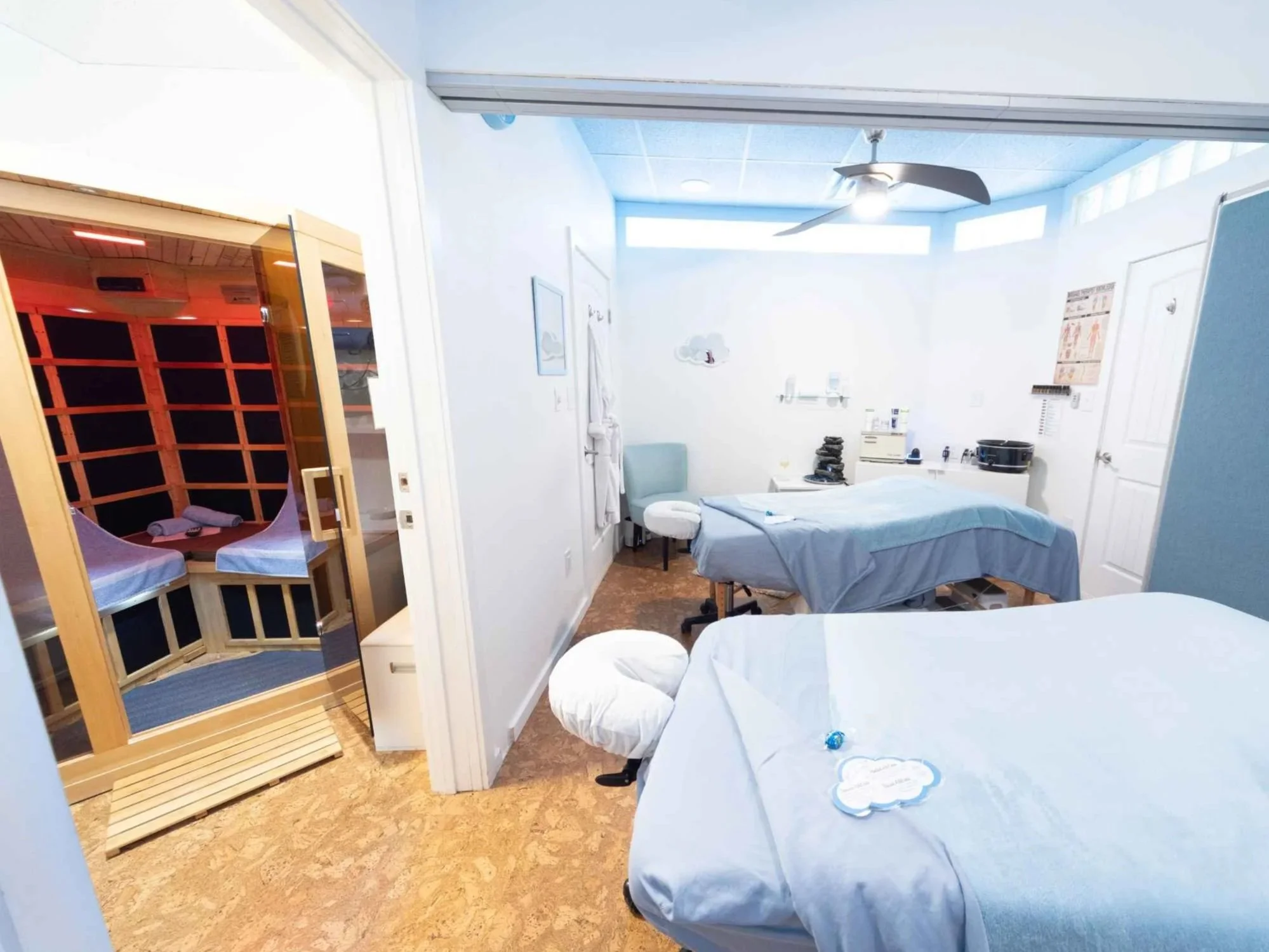 Photo of couples massage room connected to the two-person sauna for sauna and massage appointments.