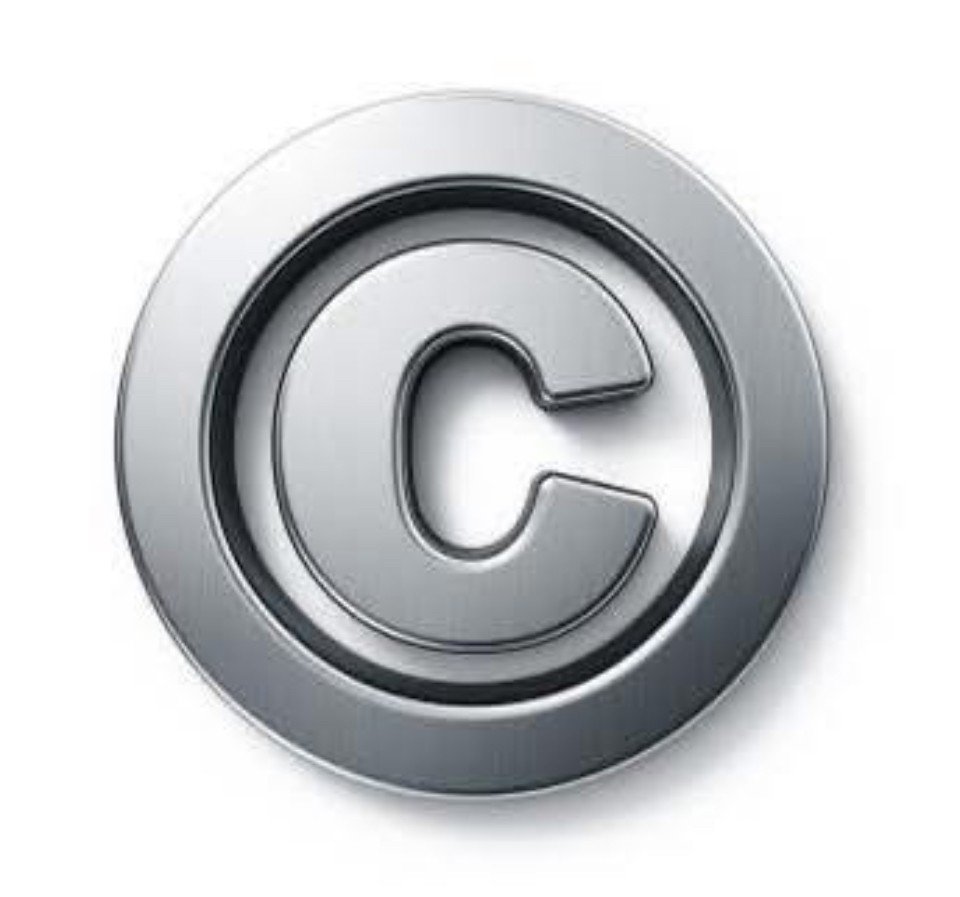 A metallic copyright symbol with a 3D effect.