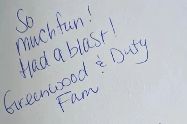 Handwritten note on white paper reading: "So much fun! Had a blast! Greenwood & Duty Farm"