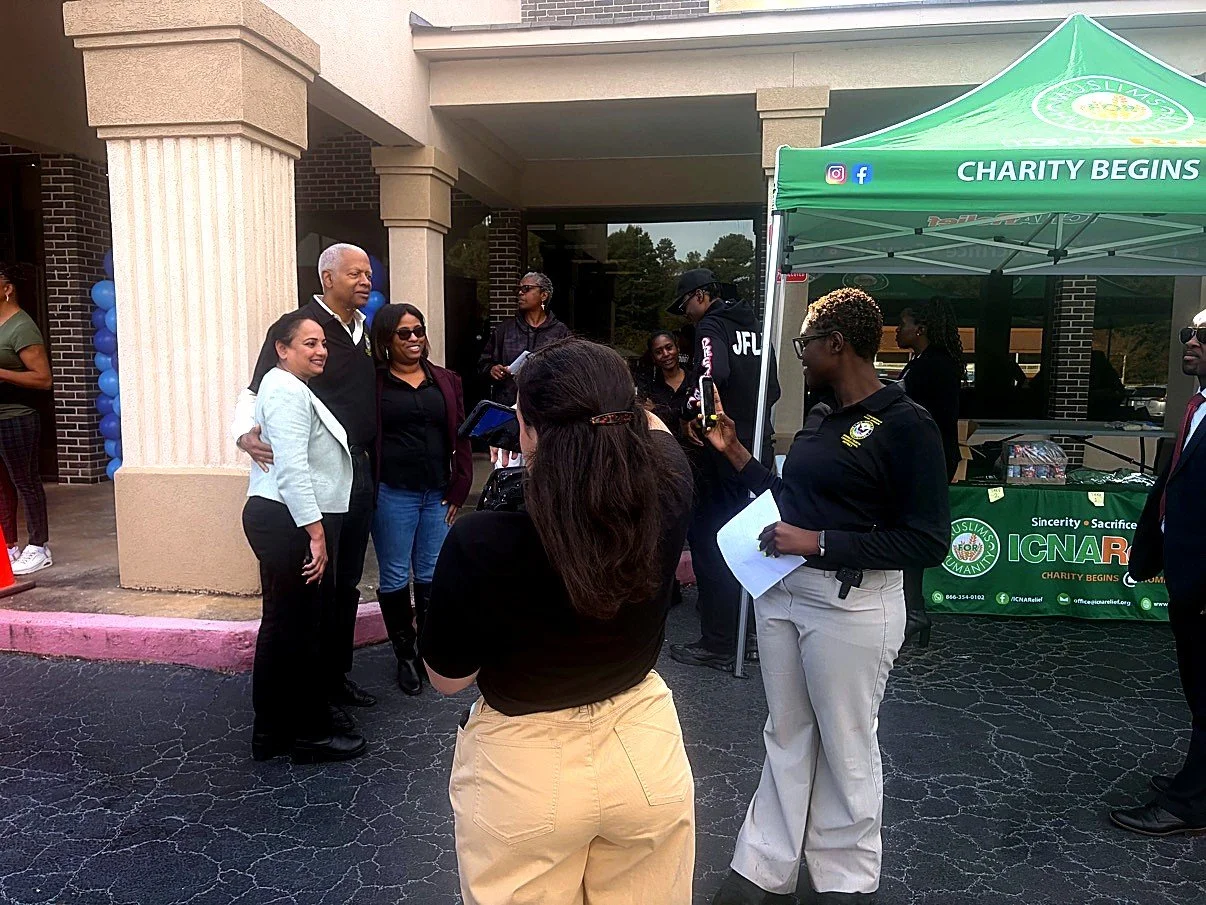 Congressman Hank Johnson greeting neighbors at the fair.