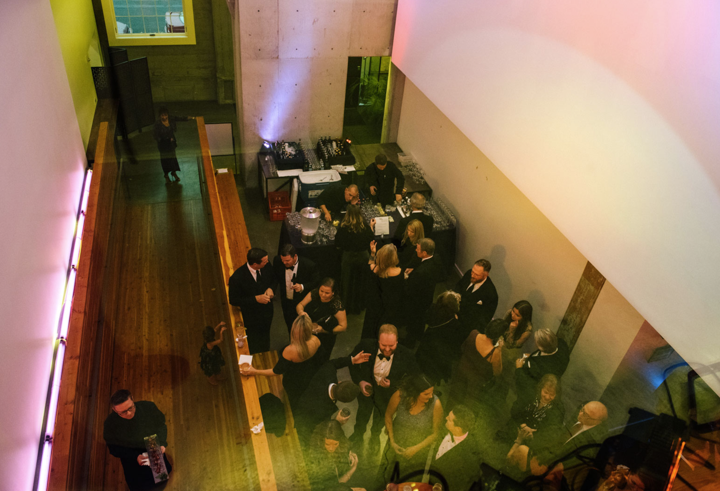 Guests celebrating at an evening event inside The Exchange in Portland.