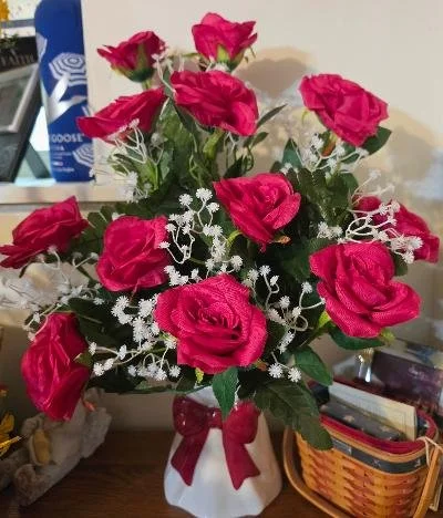 Red Roses in a White Vase