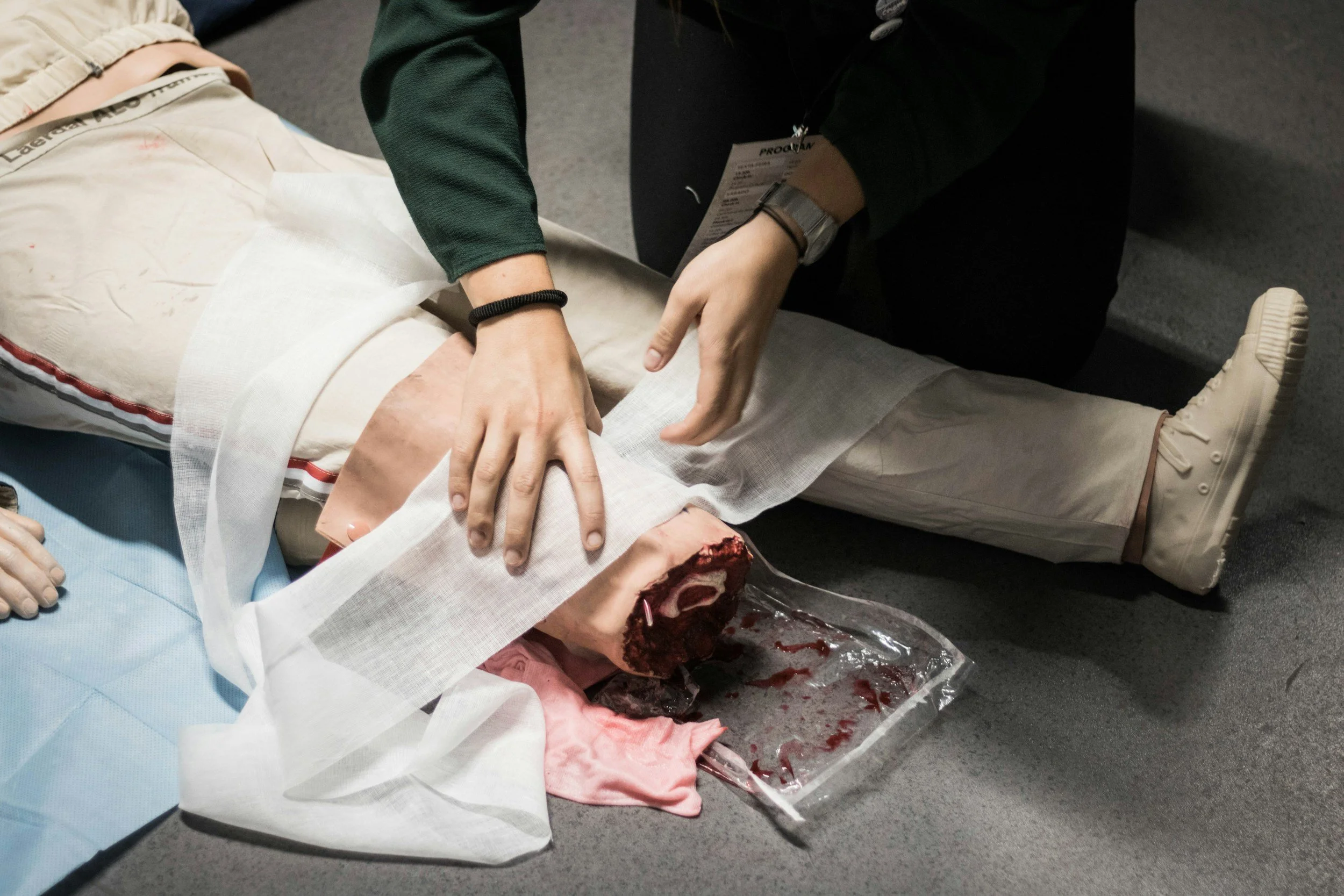 Healthcare professionals participating in hands-on medical education and clinical skills training.