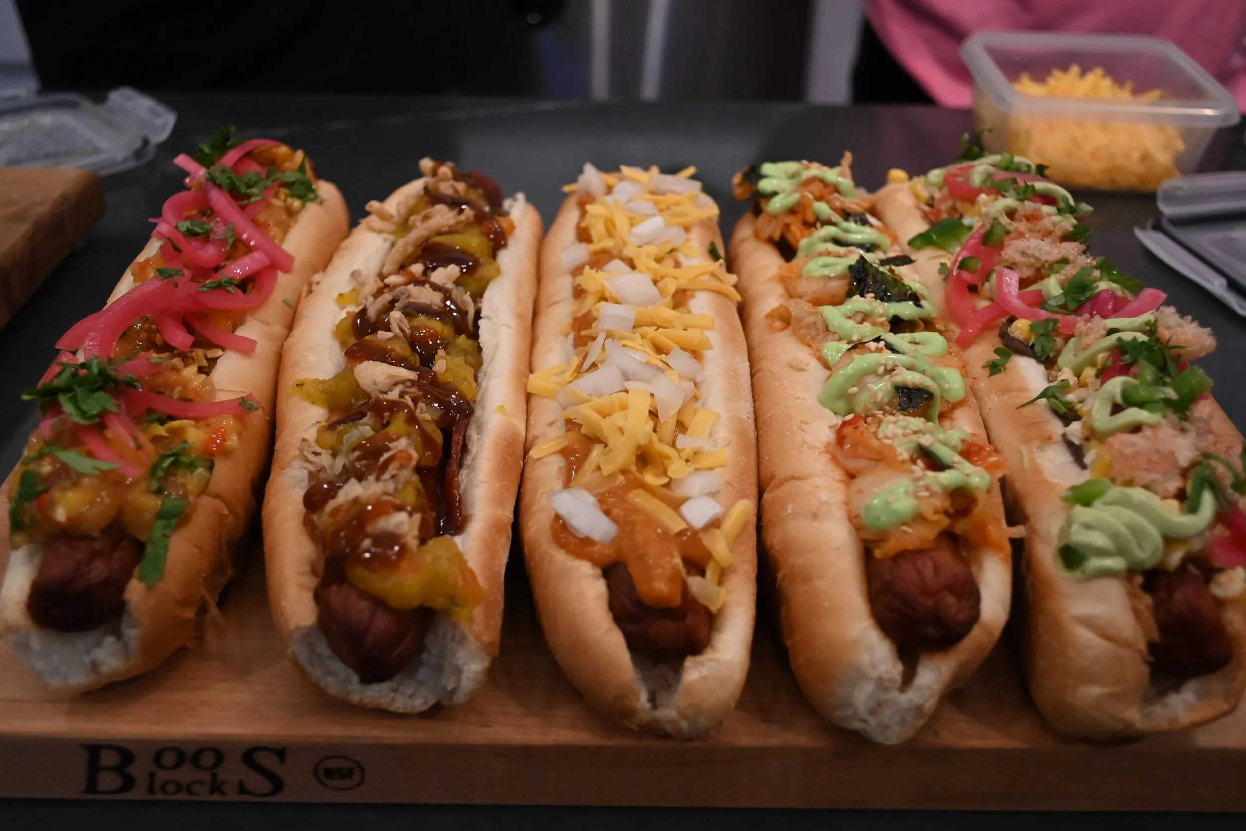 pat-the-ripper-speciality-dogs-all-lined-up-on-cutting-board.JPG