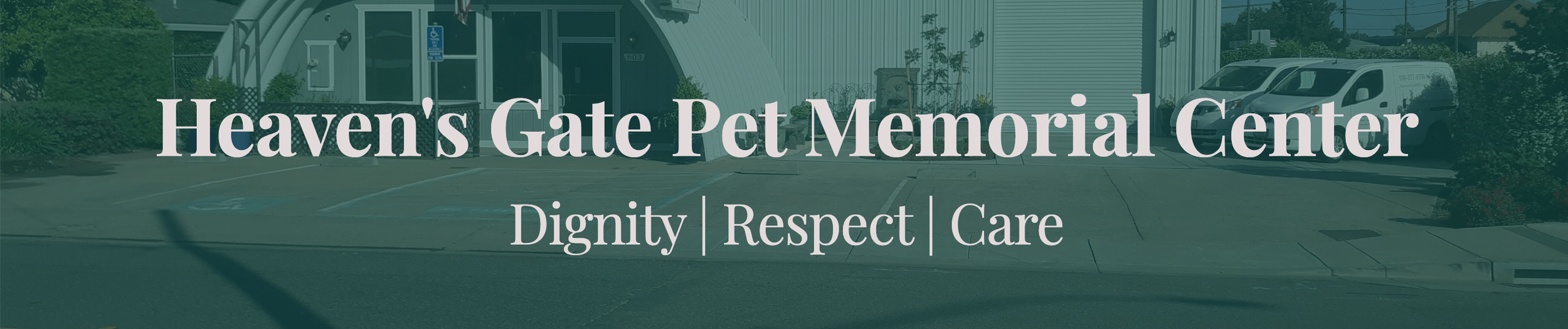 Sign for Heaven's Gate Pet Memorial Center with the words 'Dignity | Respect | Care'. The background shows the entrance of a building with parking spaces.