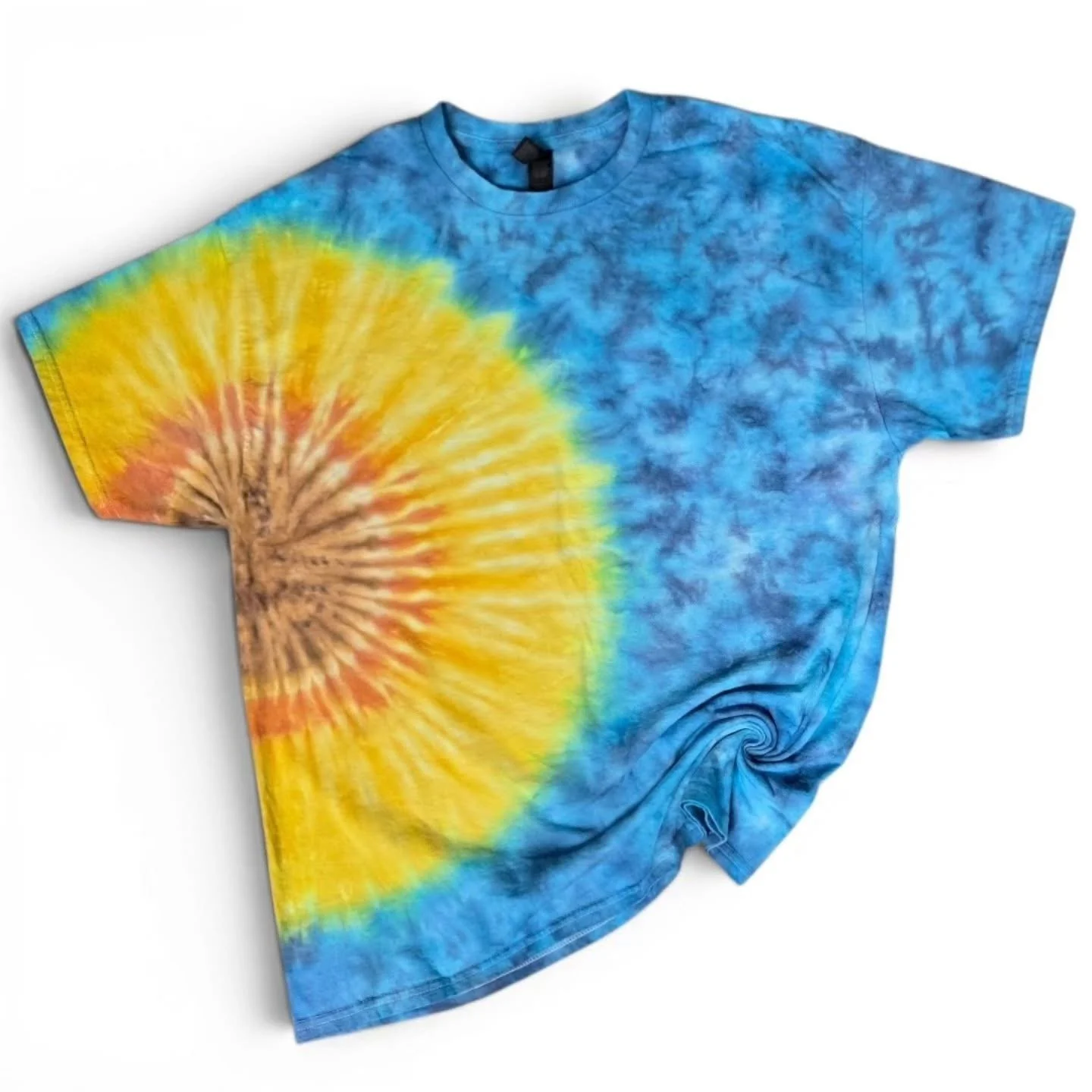 Tie-dye T-shirt with blue and yellow colors, featuring a sunflower design on the front
