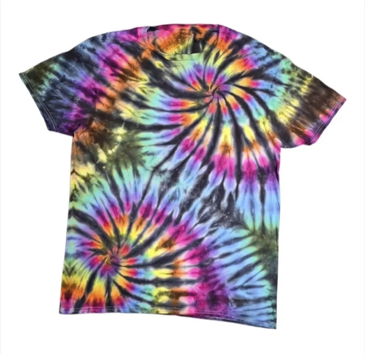 Colorful tie-dye T-shirt with spiral patterns in multiple colors including pink, yellow, blue, green, purple, and black.