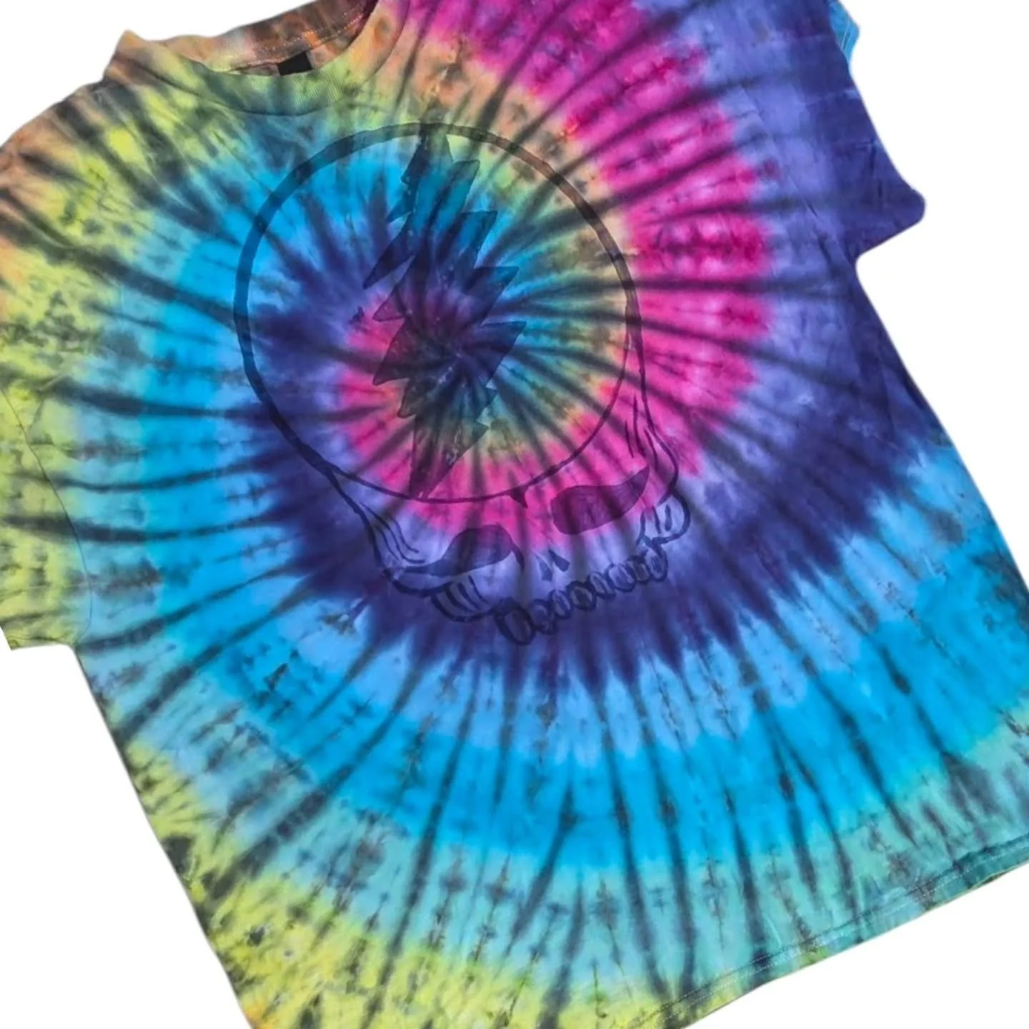 Colorful tie-dye t-shirt with a Lightning Bolt logo inside a circle and a banner that says 'The Brotherhood' beneath it.