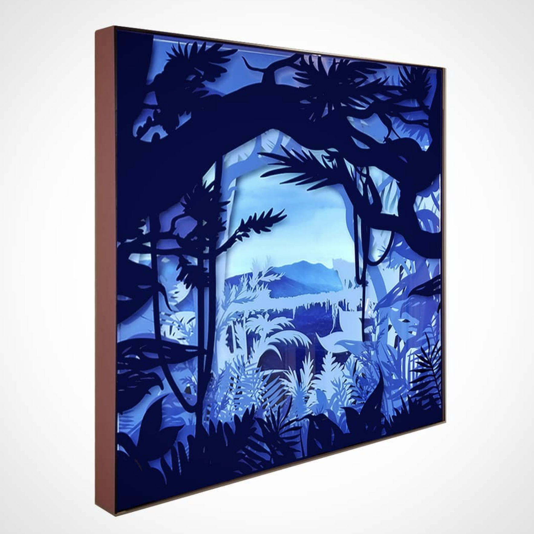 Illuminated Jungle Shadow Box:

This dimensional artwork combines layered acrylic prints, lighting, and depth to create an immersive visual scene. The design demonstrates how traditional wall art can evolve into architectural décor by integrating scu