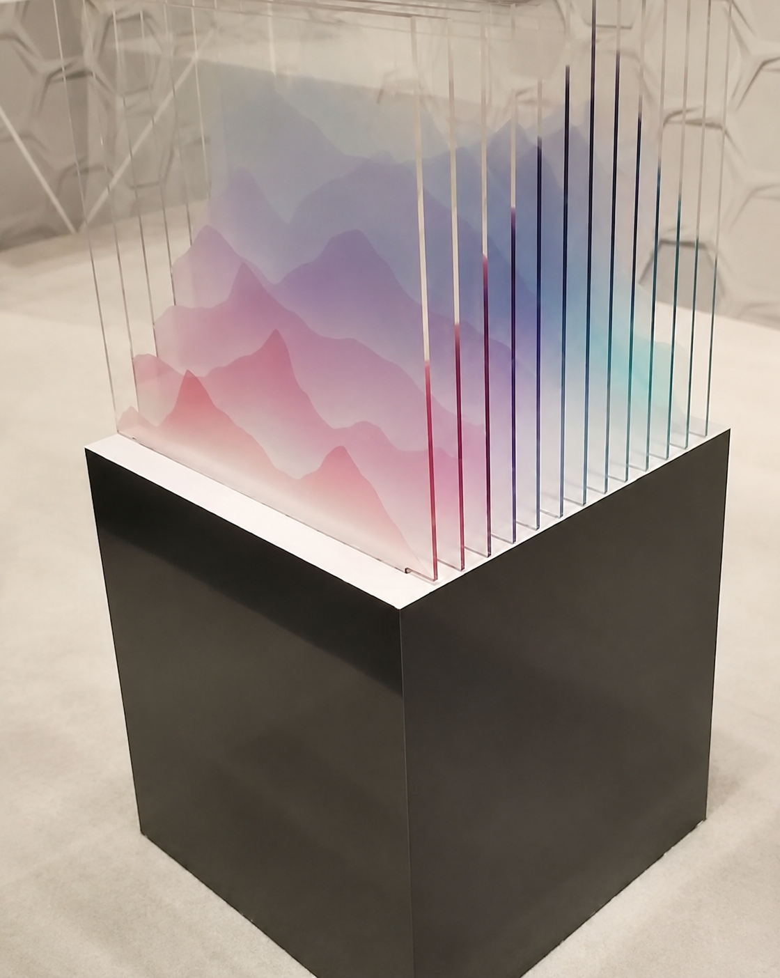 Layered Acrylic Landscape:

This prototype explored the visual possibilities of stacked translucent acrylic panels to create a three-dimensional landscape. The changing perspective and subtle color gradients allow the artwork to shift as the viewer m