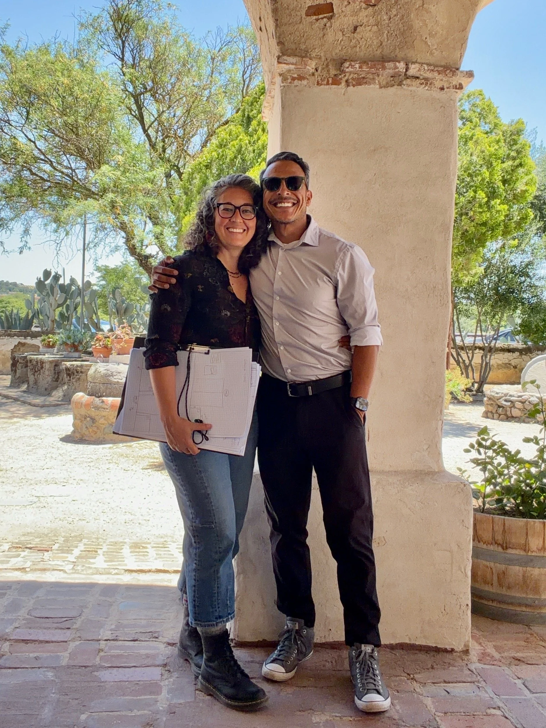 Rigoberto and Denise posing at a job