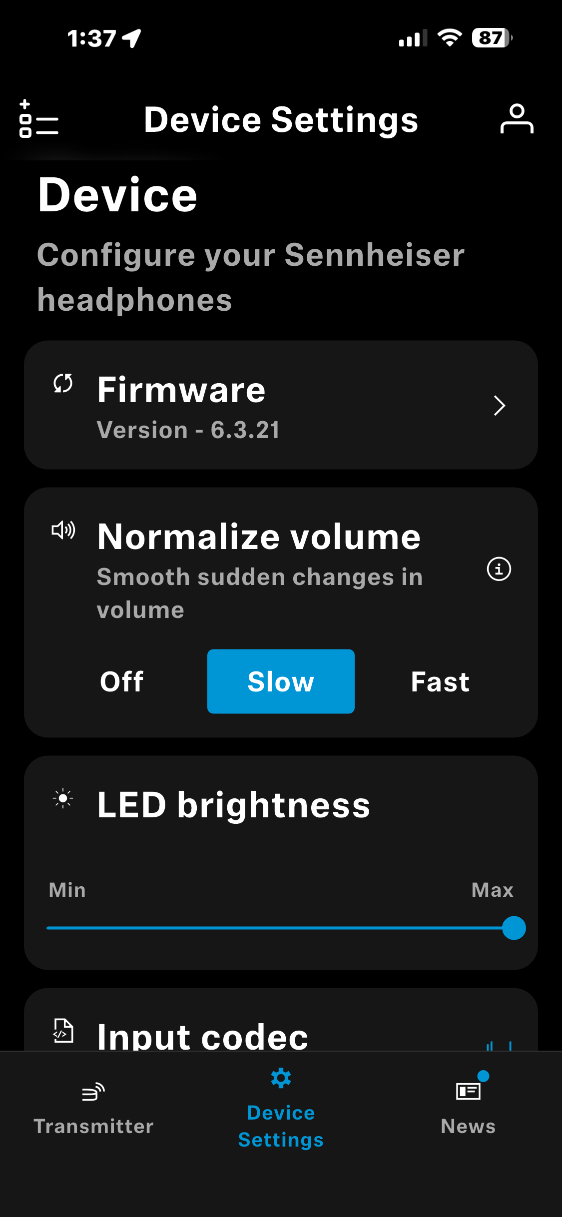 Screenshot of a mobile app displaying device settings for configuring Sennheiser headphones, including firmware version 6.3.21, normalize volume set to slow, and LED brightness slider.
