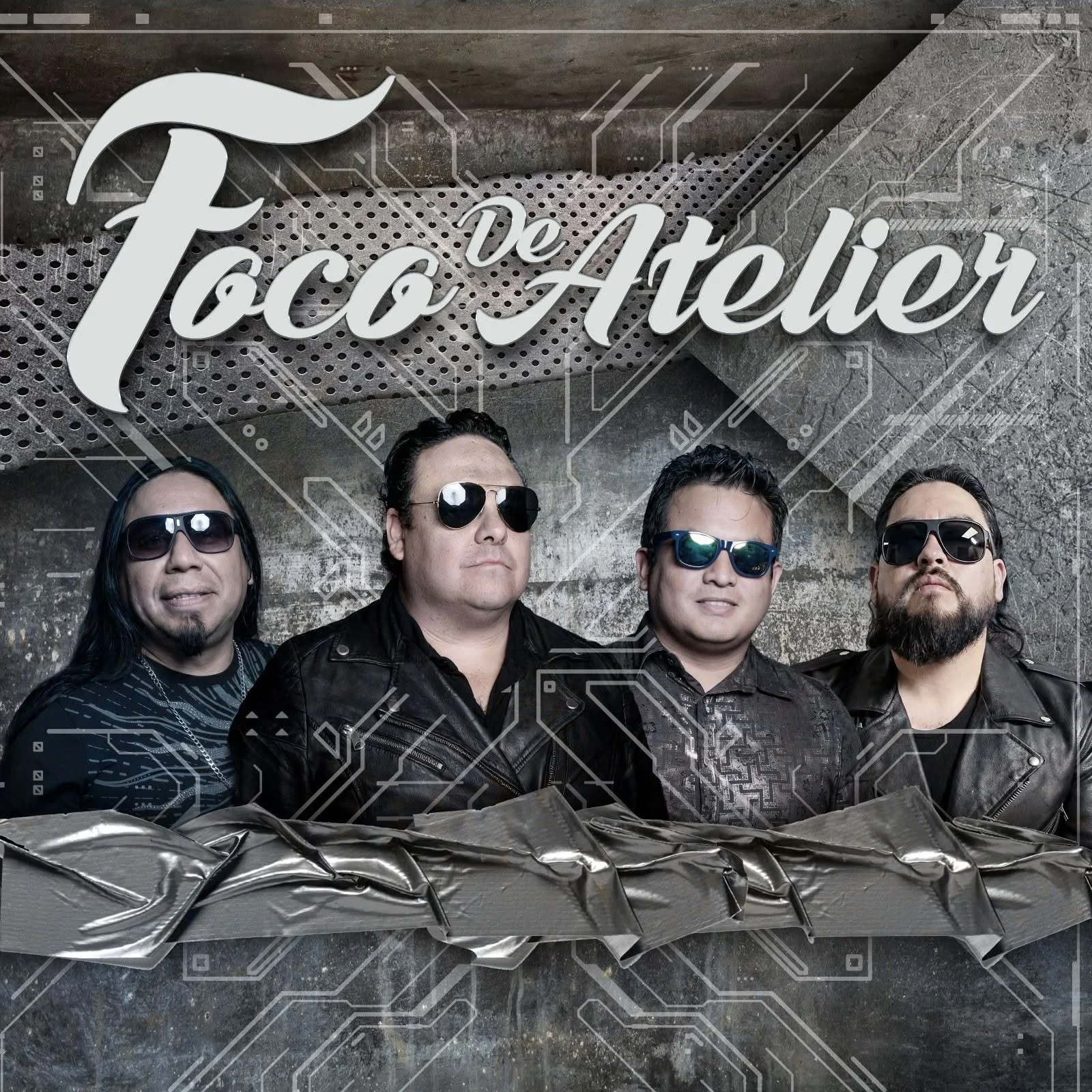 Four men with dark hair and sunglasses standing in front of a metallic background, with a sign above them reading "Toco De Aletar."