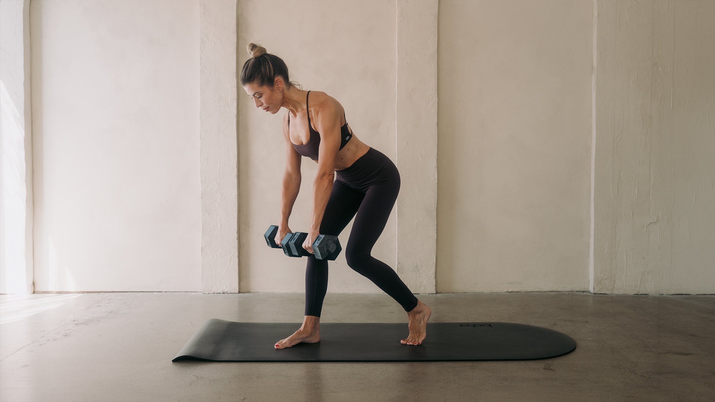 Andrea Speir mat strength training, bent-over dumbbell row