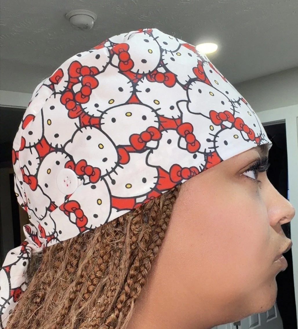 Hello Kitty Cap w/Badge Reel