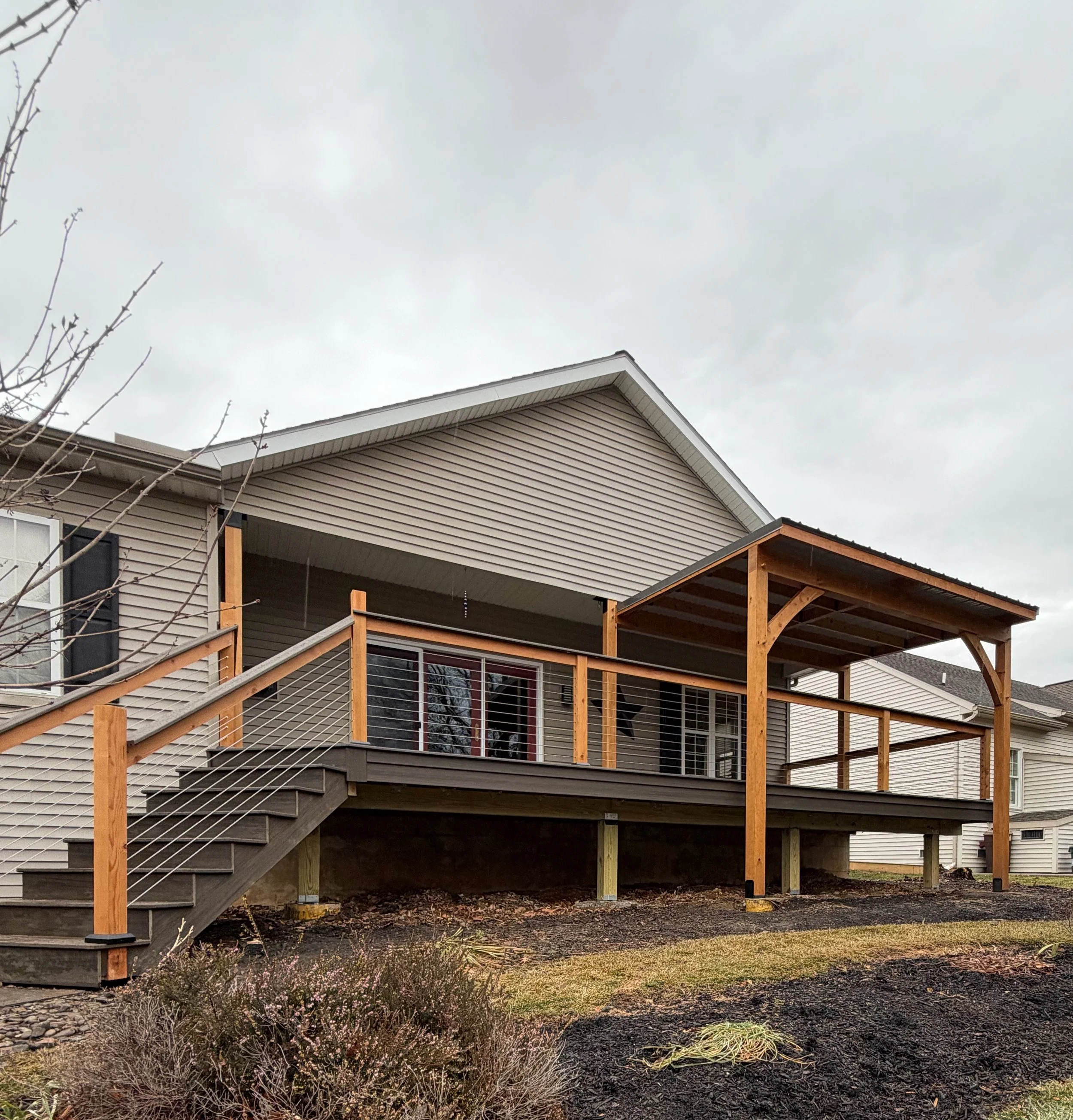 Covered porch with timber posts and stairs, Sussex County DE