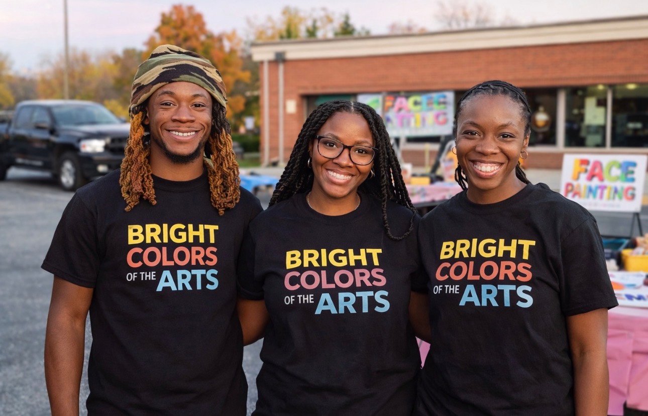 Bright Colors of the Arts group at an outdoor face-painting event
