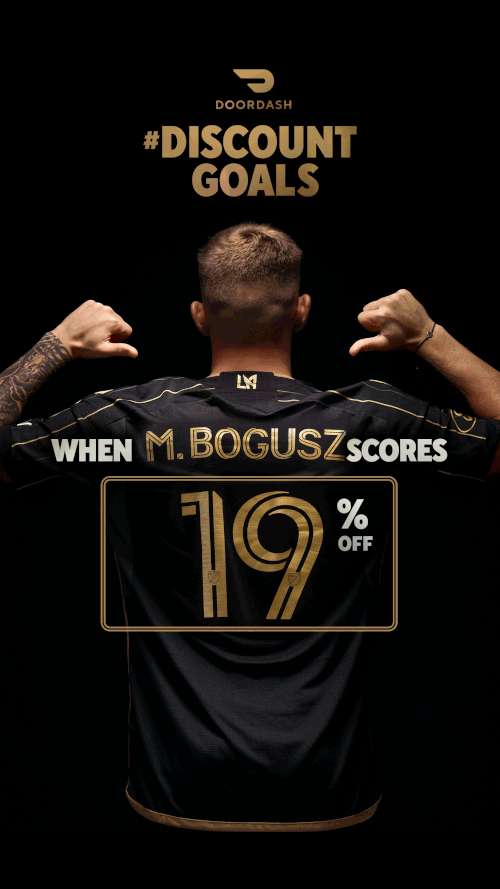 Back of a man with tattoos flexing his arms, promoting a DoorDash discount goal of 19% off when M. Bogusz scores 19 points.