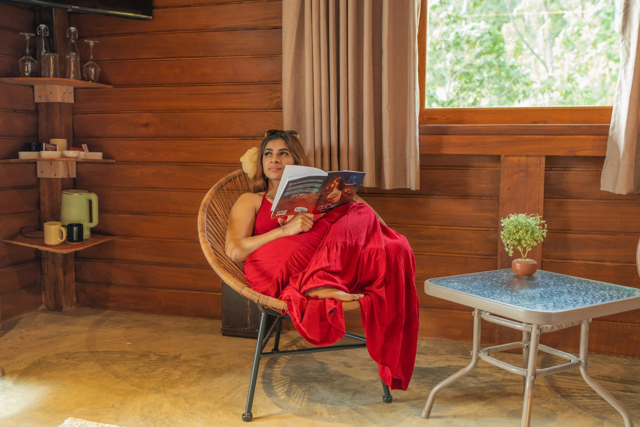 Woman reading a book , taking time for herself to resist career burnout