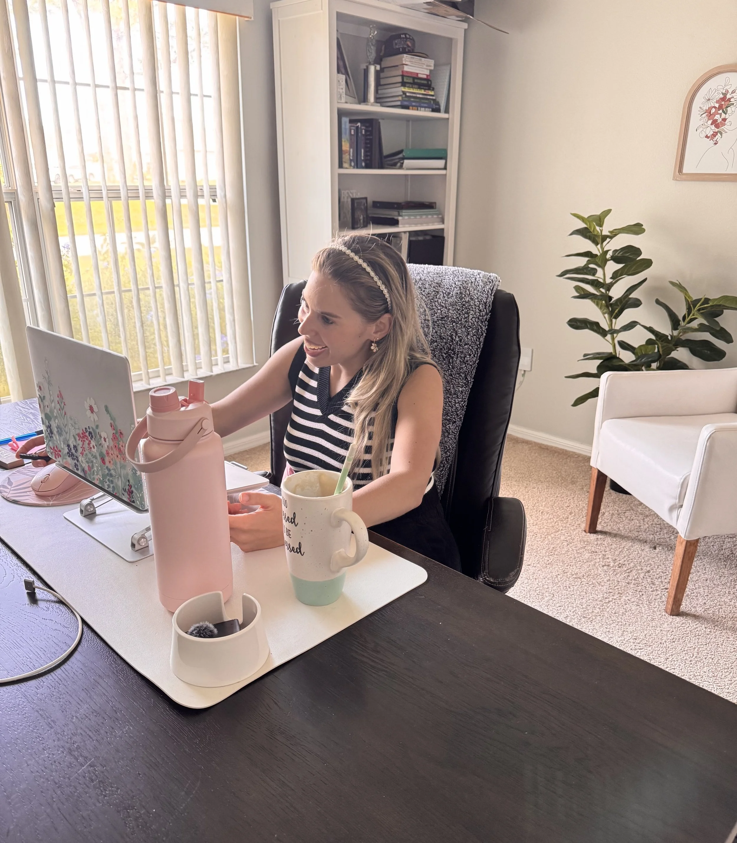 Mother and professional woman smiling on a video call, starting virtual burnout therapy for career women