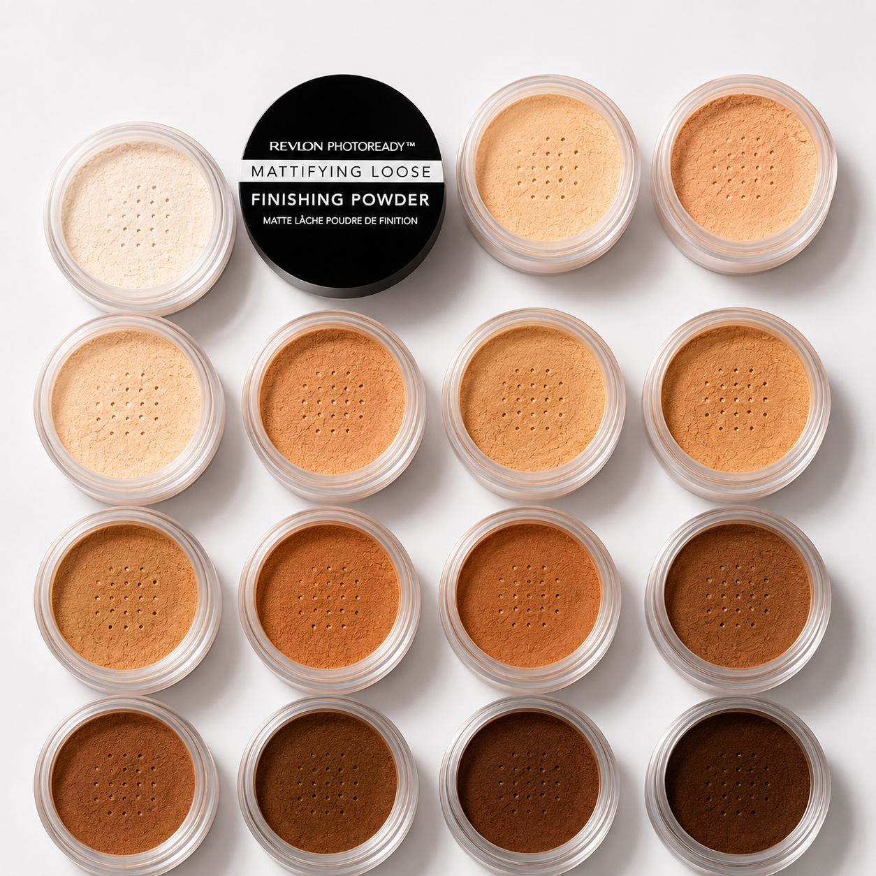 Collection of 15 black and tan loose powder makeup containers arranged in a grid pattern, with a black lid labeled 'Revlon Photoready Mattifying Loose Finishing Powder' at the top center.