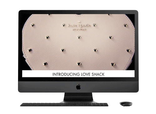 Computer screen displaying a Kate Spade love shack handbag with metallic studs and a leather texture.