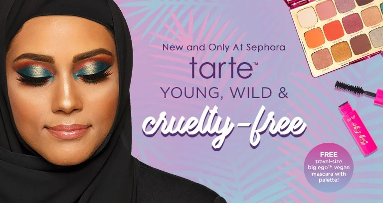 Advertisement for Tarte Young, Wild & Cruelty-Free makeup, featuring a woman with colorful eyeshadow, the Tarte palette, mascara, and a free travel-size vegan mascara.