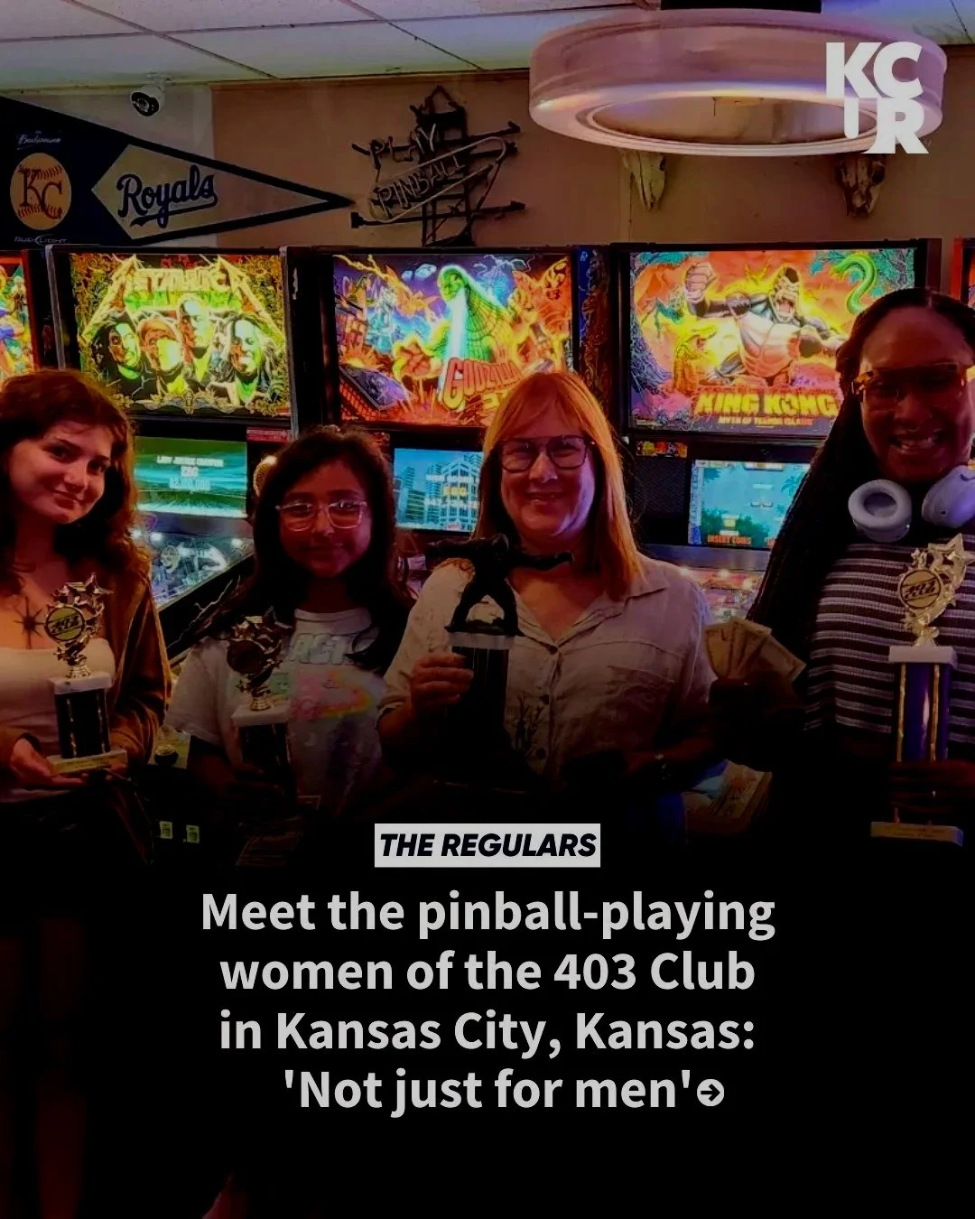Guests posing inside 403 Club surrounded by glowing arcade and pinball machines in historic Strawberry Hill, Kansas City. The scene promotes the Kansas City 403 Club, highlighting women who play pinball.