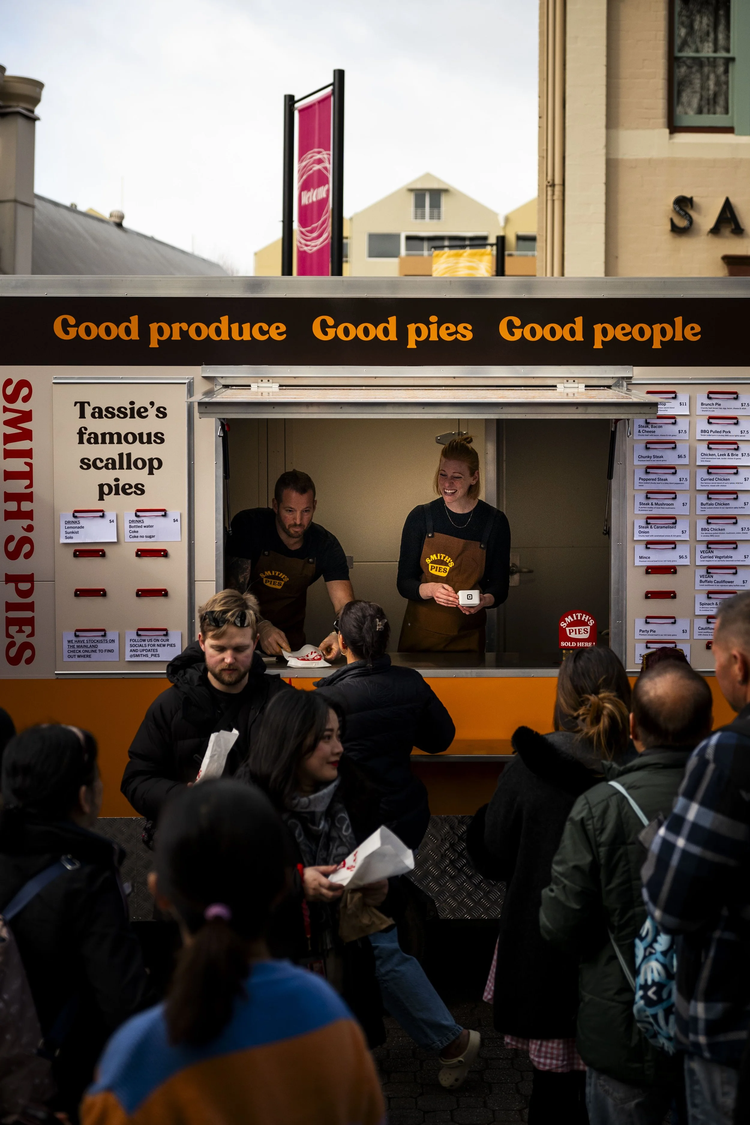 Smith's Pies serving customers at Salamanca Market in Hobart Tasmania