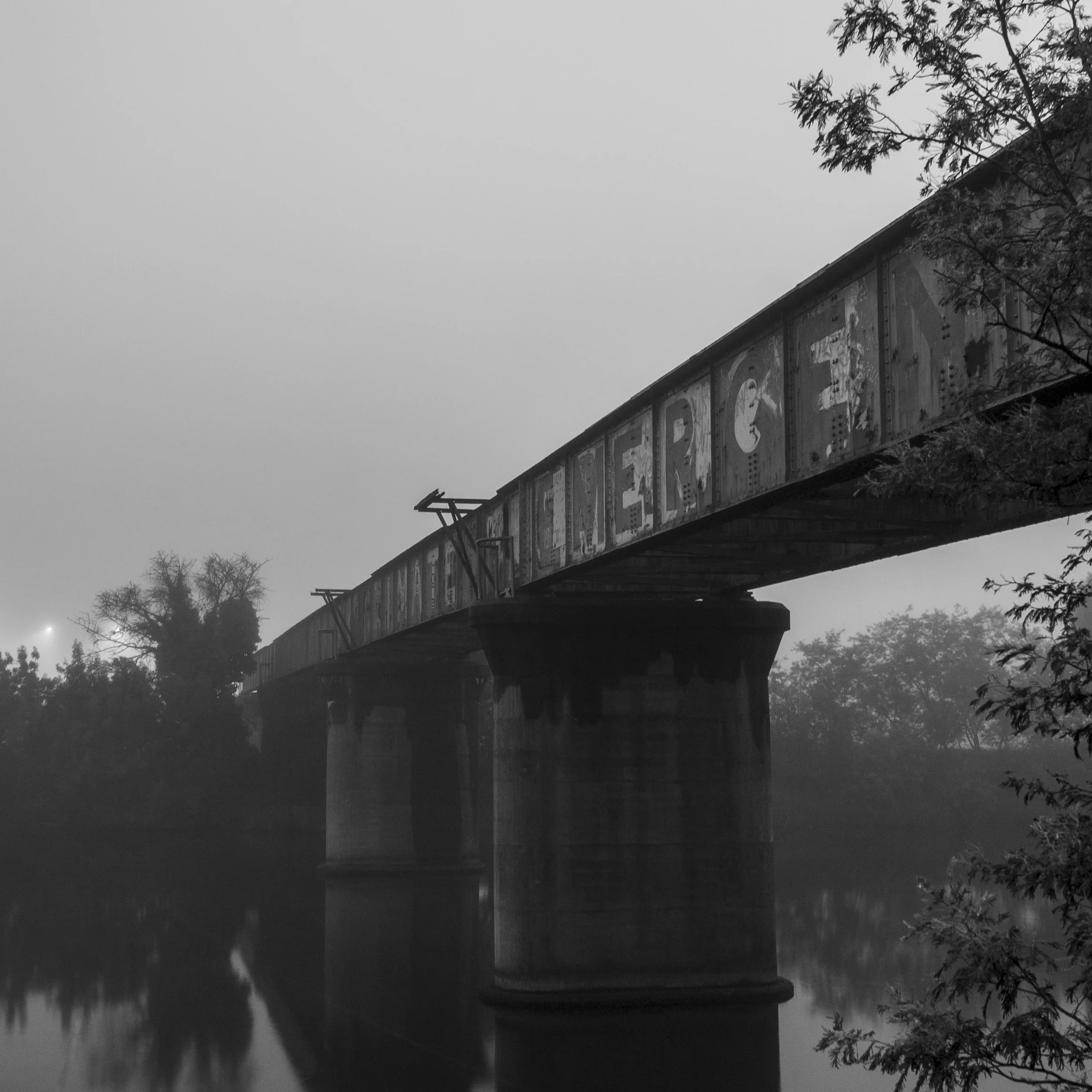 The old railway bridge over the Mitchell River emerges through the morning fog at Bairnsdale.