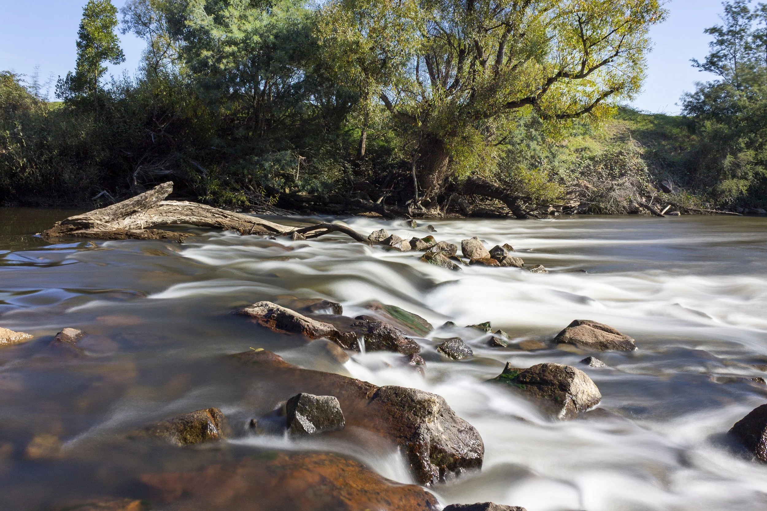 The former site of the heritage-listed Bairnsdale Pumping Station on the Mitchell River at Bairnsdale, Victoria, where the remains of the historic site meet the changing river landscape.