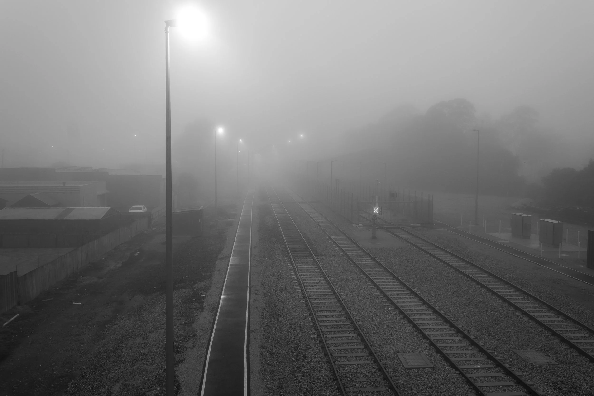 Bairnsdale railway station disappears into the morning fog.