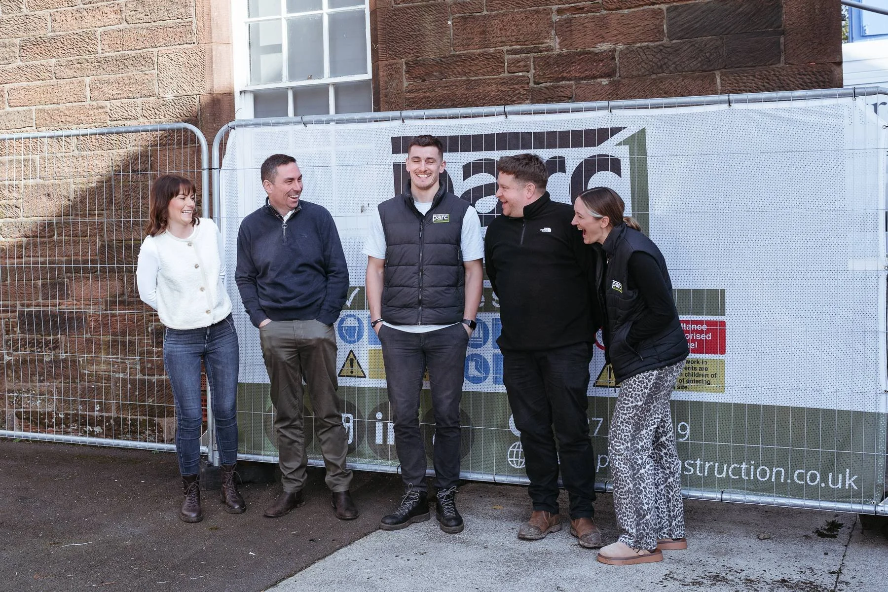 Parc Construction team members pictured together on a live construction site in Dumfries