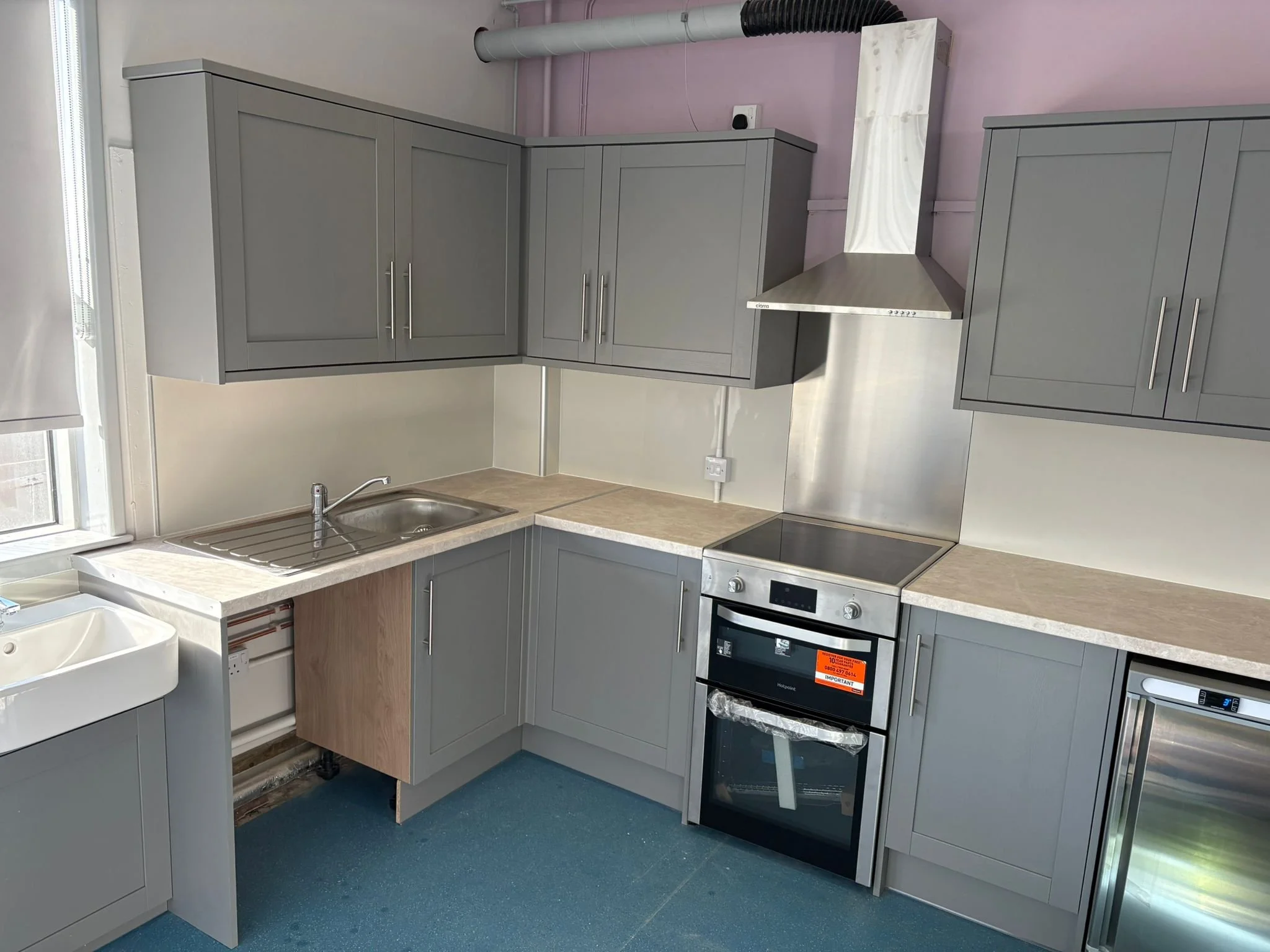 New staff kitchen with integrated appliances, extract and full second-fix joinery.