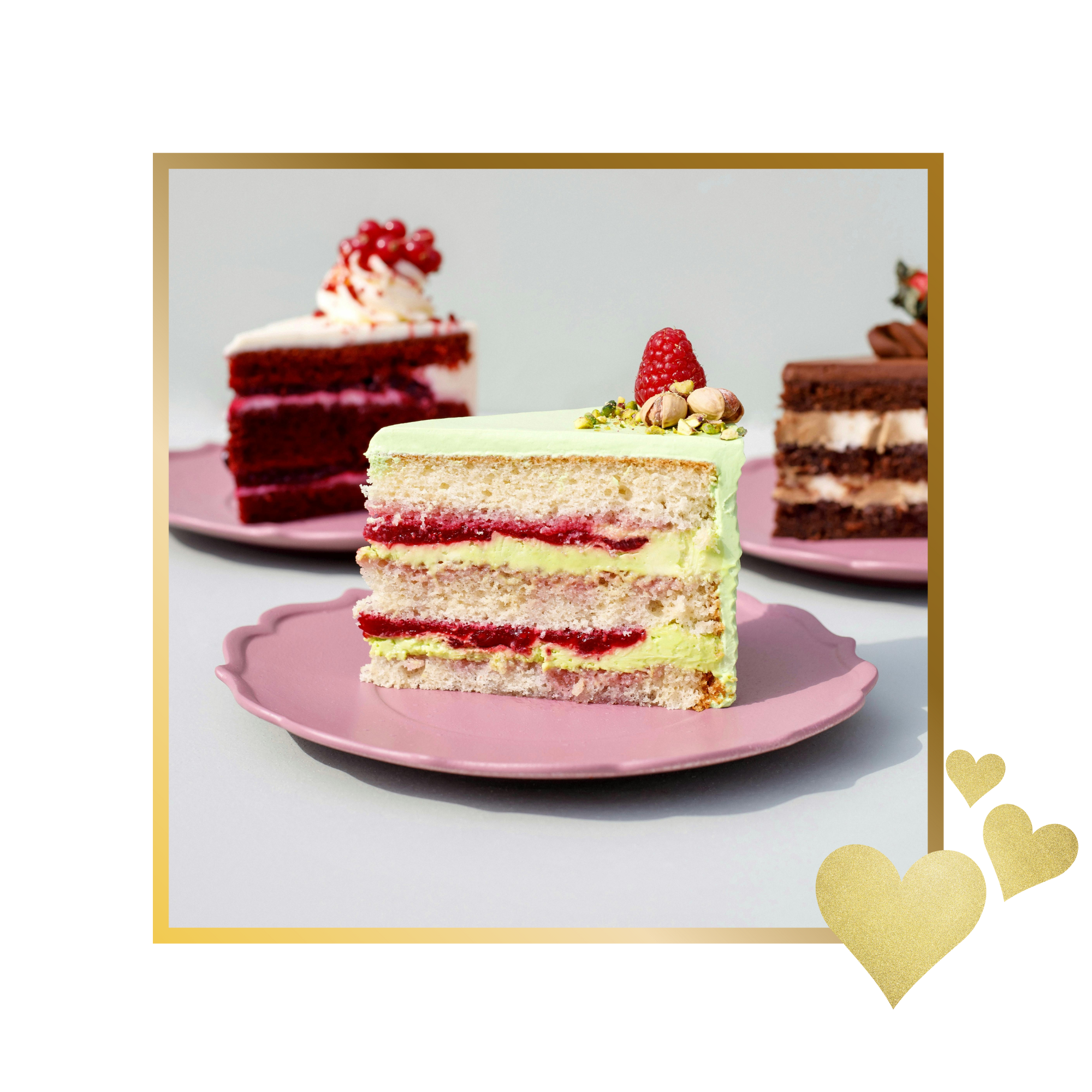 Slices of layered cake with cream, fruit, and nuts on pink plates.