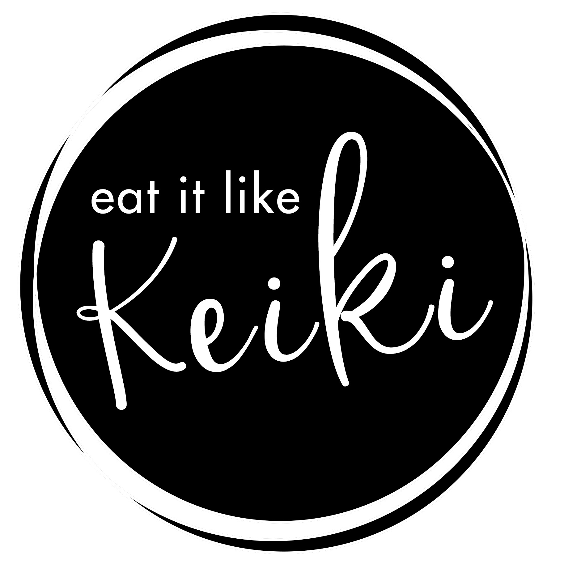Round black and white sign with the words "eat it like cookies" written in cursive font.