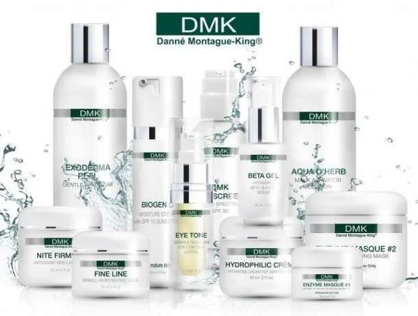 Collection of skincare products from DMK, including cleansers, creams, serums, masks, and toners.