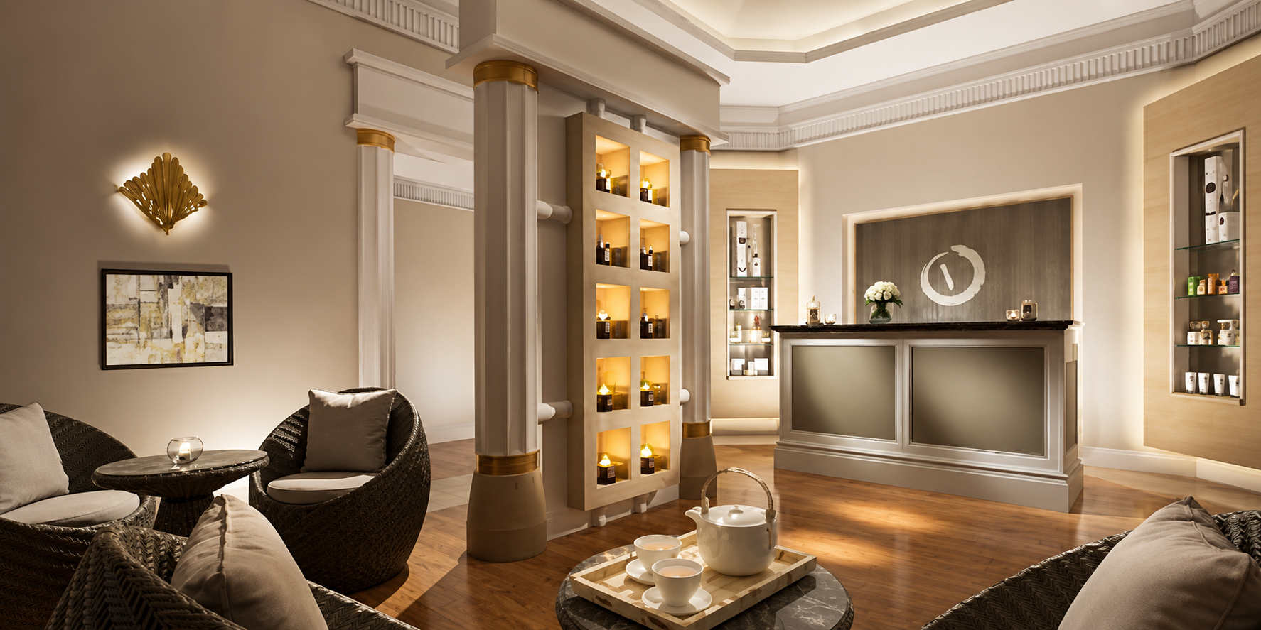 A cozy, elegant hotel lobby with soft lighting, a reception desk, and seating area with wicker chairs and pillows. Decorative shelves with bottles and books are integrated into the walls, and a tea set is on a small round table in the foreground.