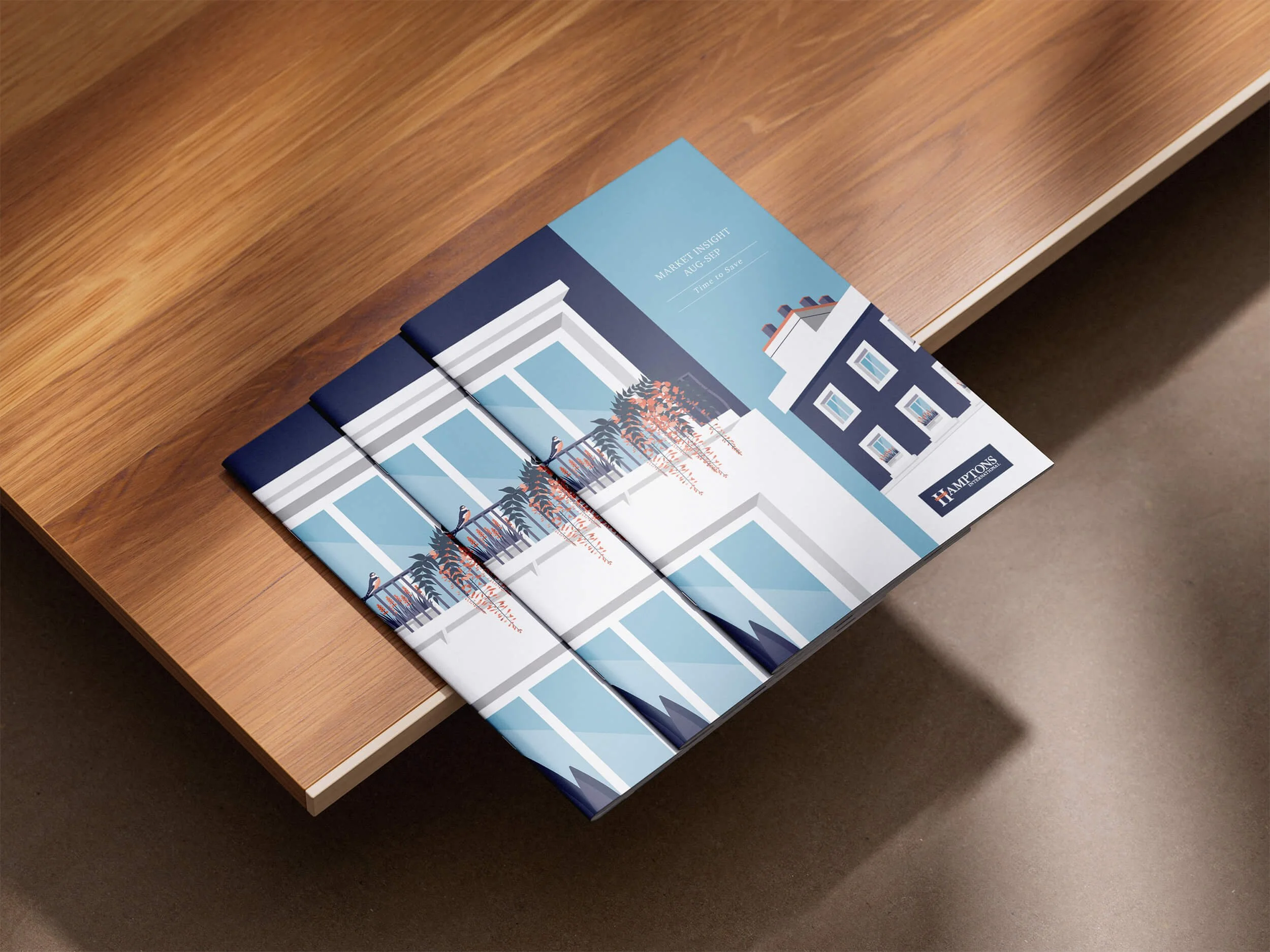 Three brochures featuring an illustration of 2 London townhouses