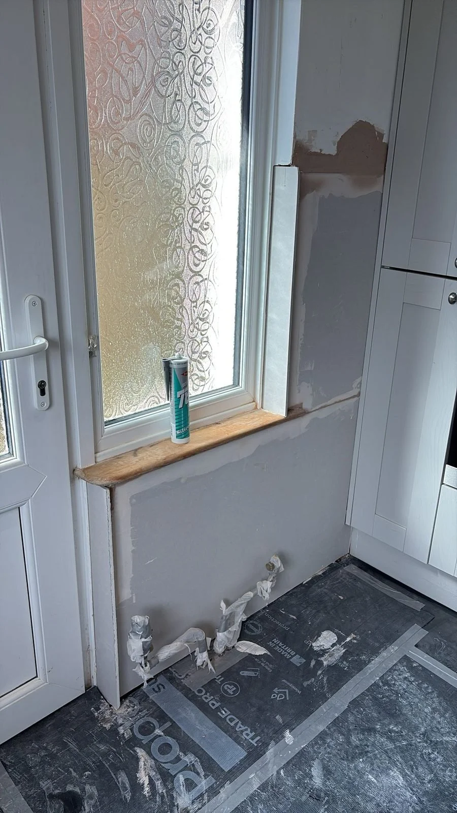 During: kitchen wall plastered ready for finish — Hastings