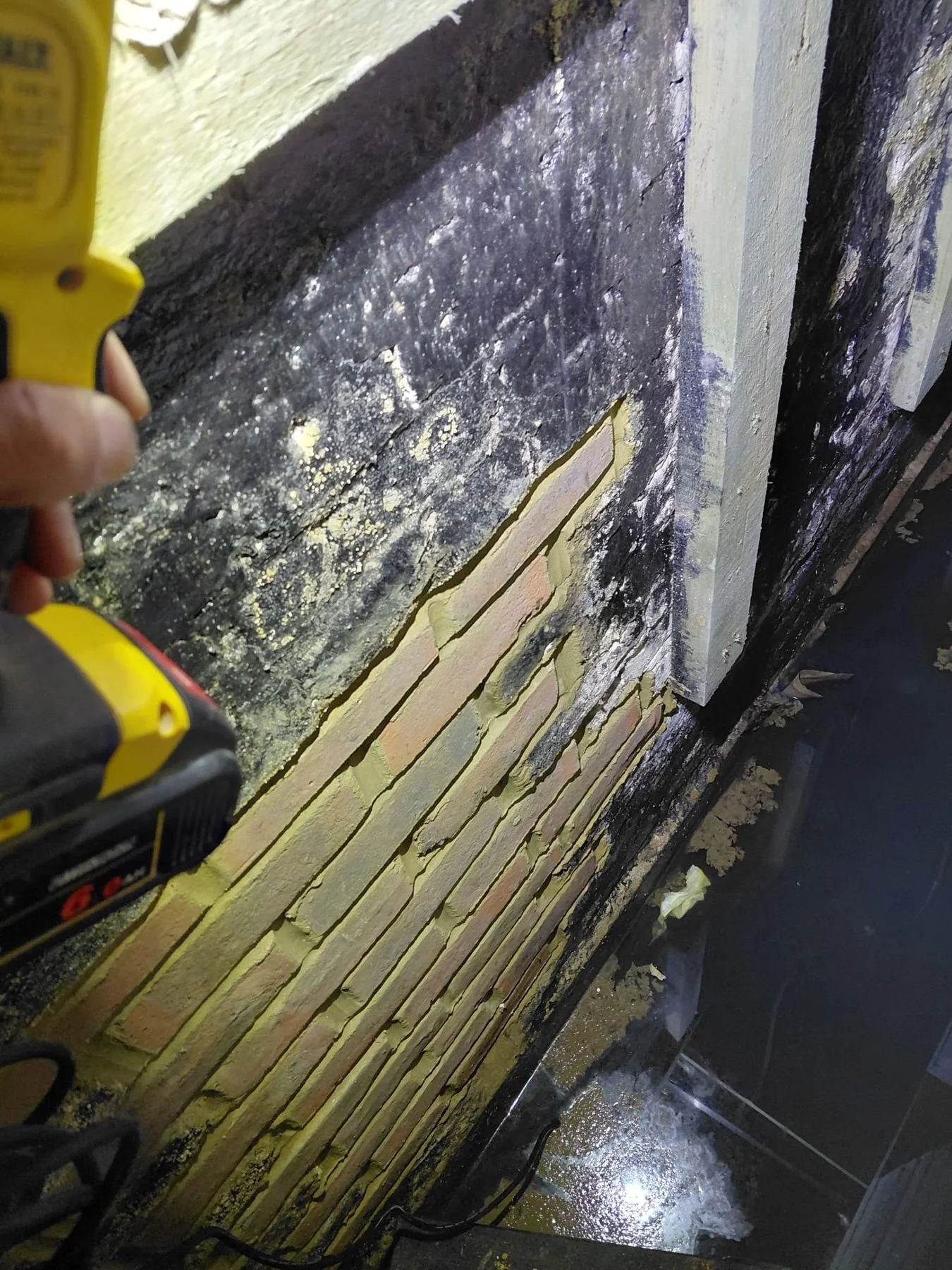 During: basement waterproofing tanking with residual standing water — Bexhill