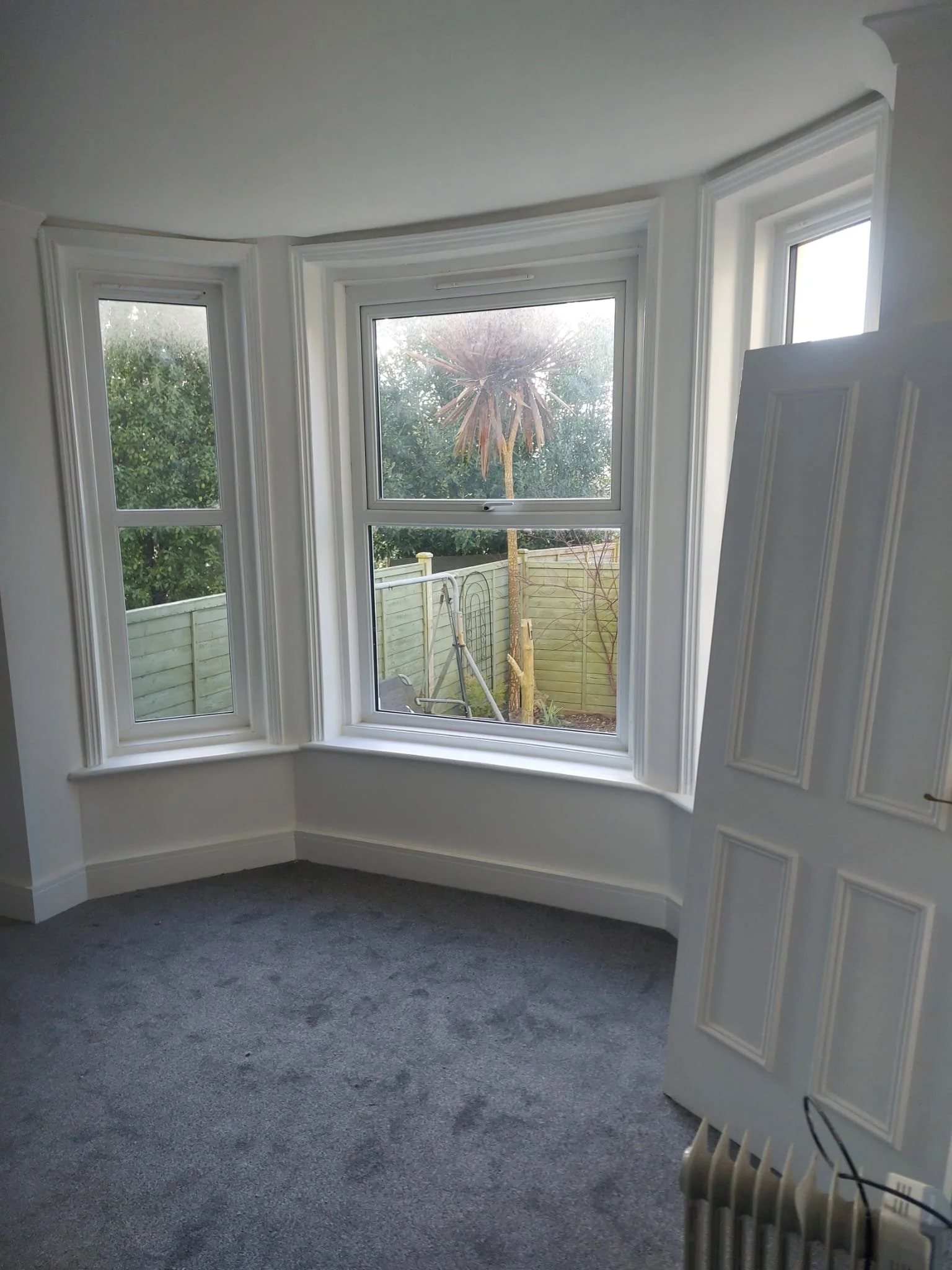 Bay-window room finished after Renovani damp remedial works.