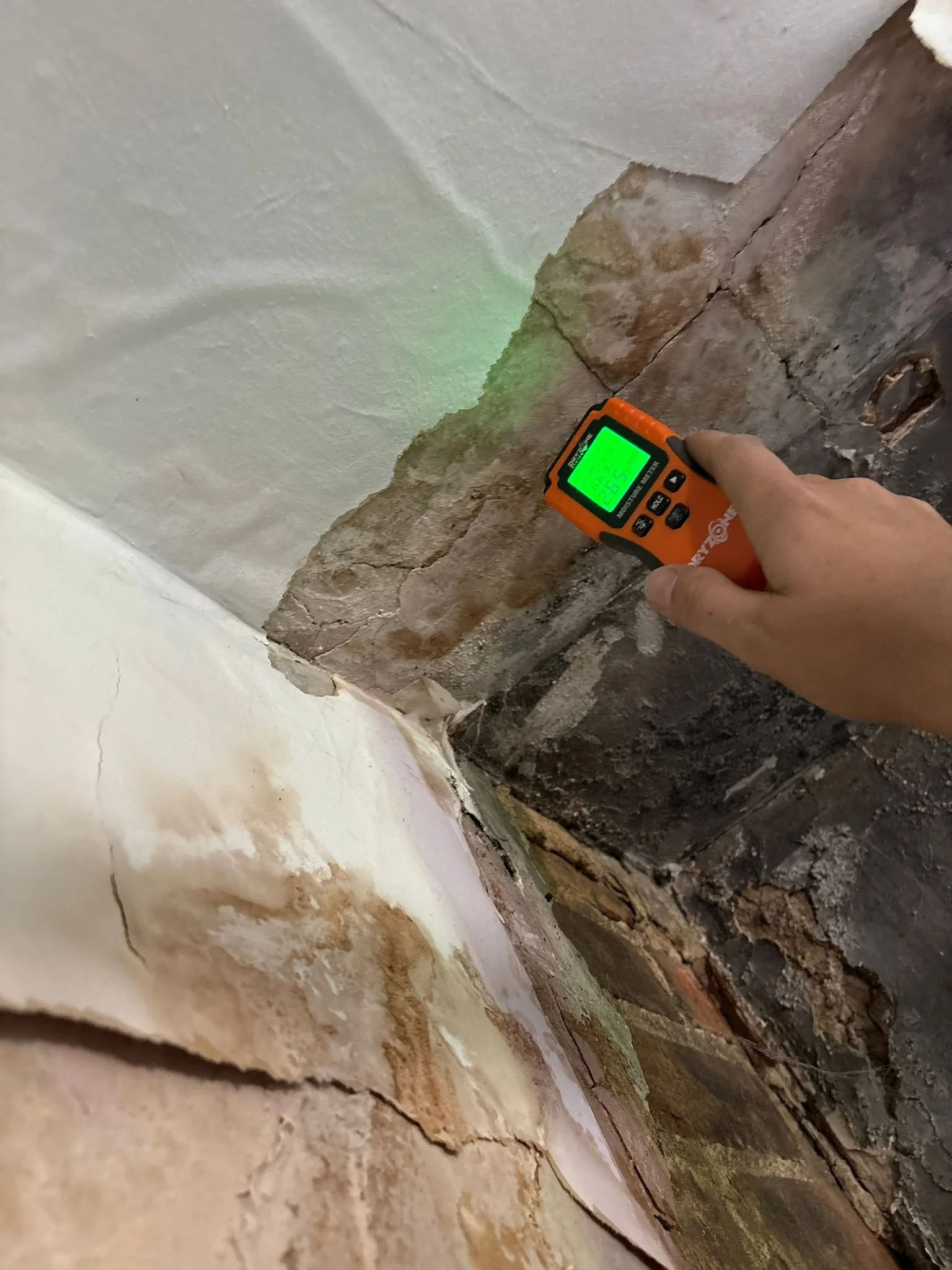 Moisture investigation at a damaged chimney breast.