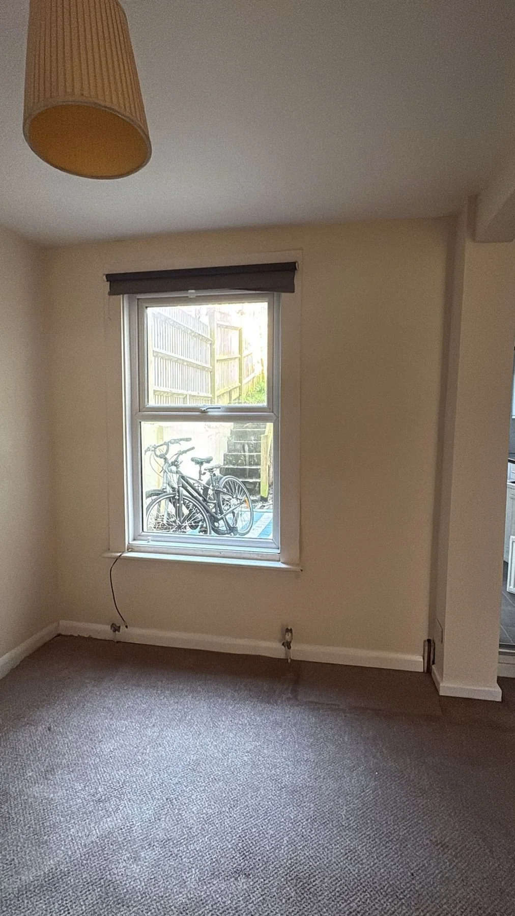 After: completed room with dry walls and new carpet — Hastings