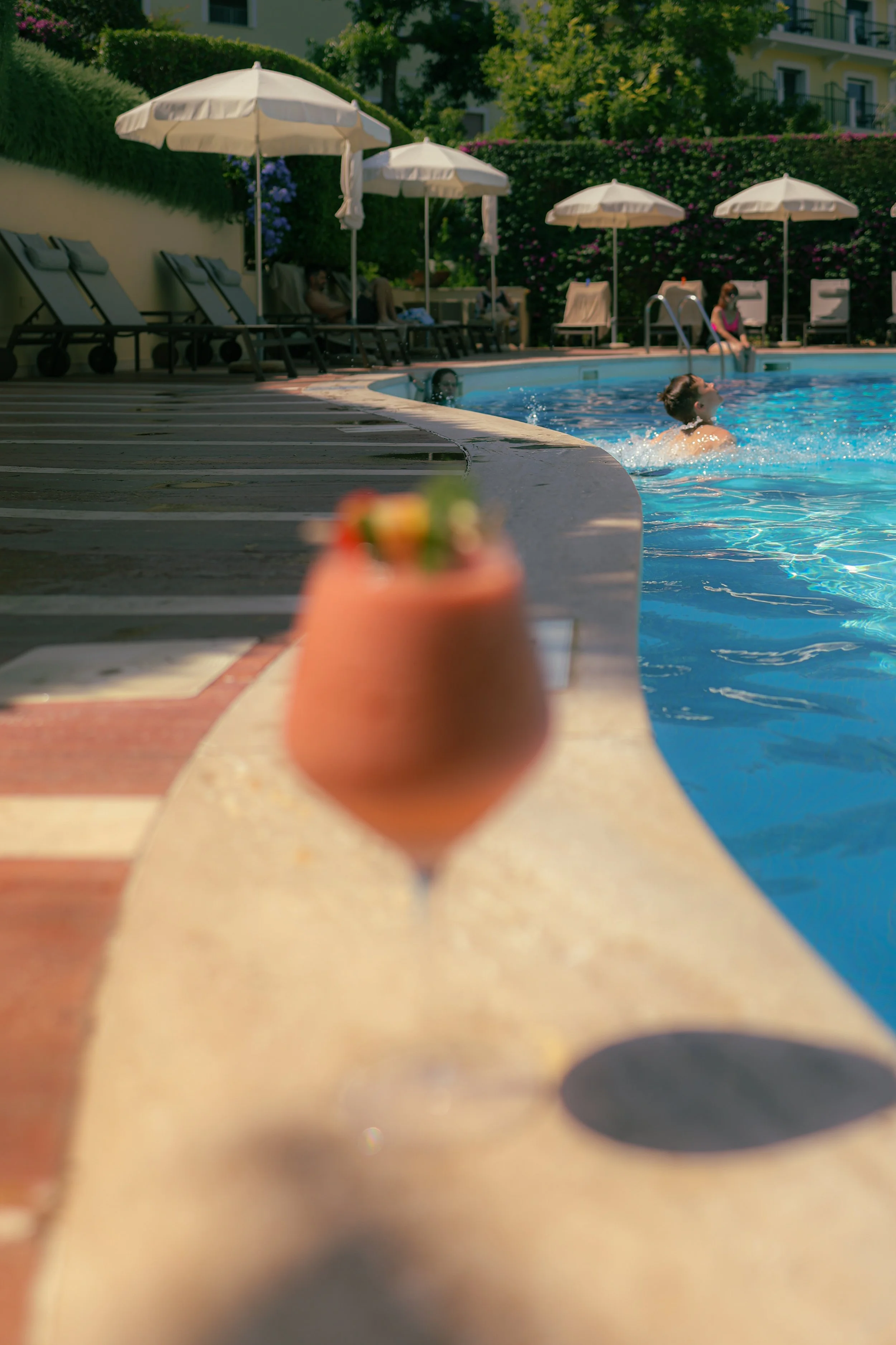 Hospitality photographer for Hotel Tramontano in Sorrento, photographing the swimming pool at the hotel along with cocktails and coffee