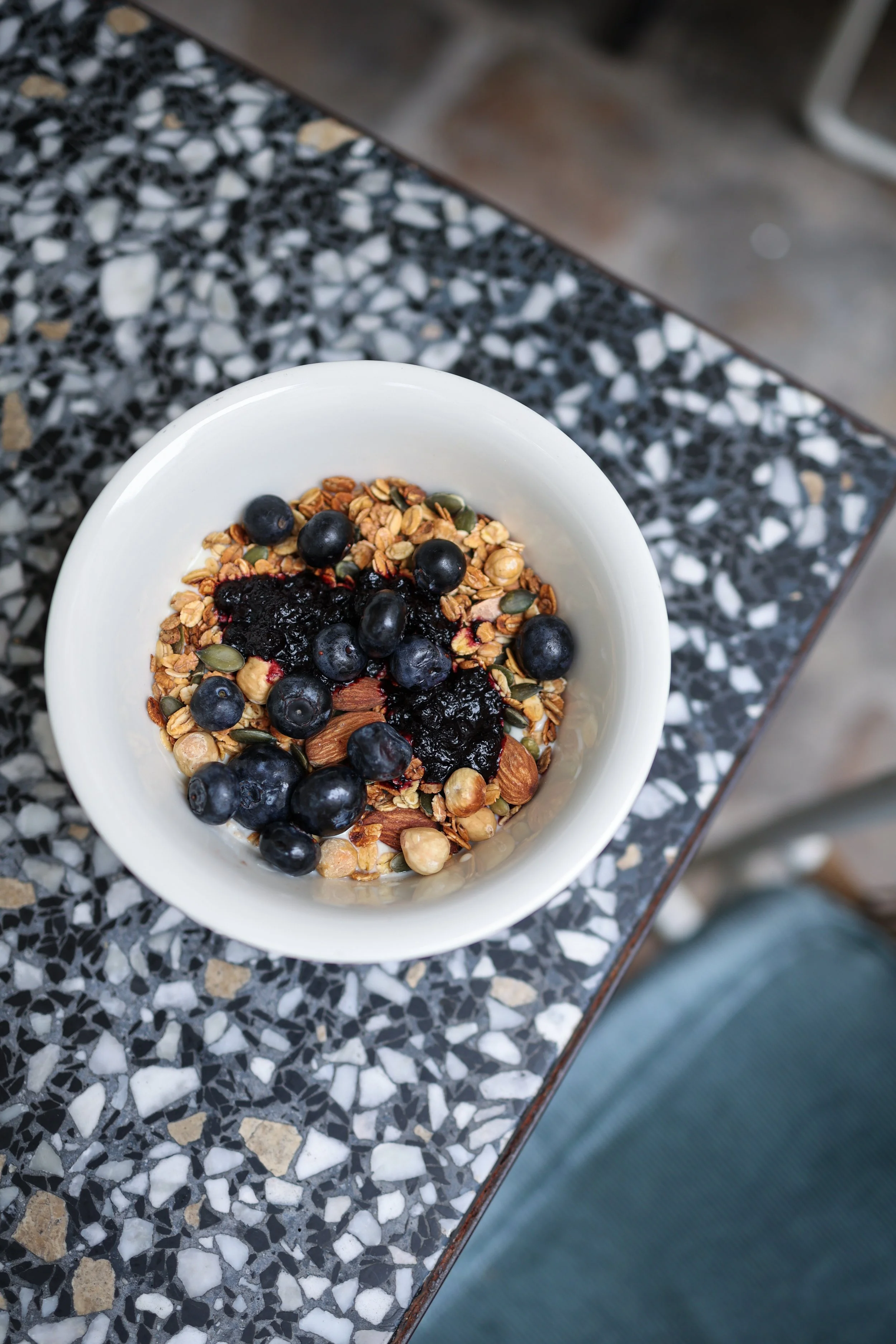 Hospitality photographer The Hoxton Hotel in Paris photographing breakfast, granola and matcha latte